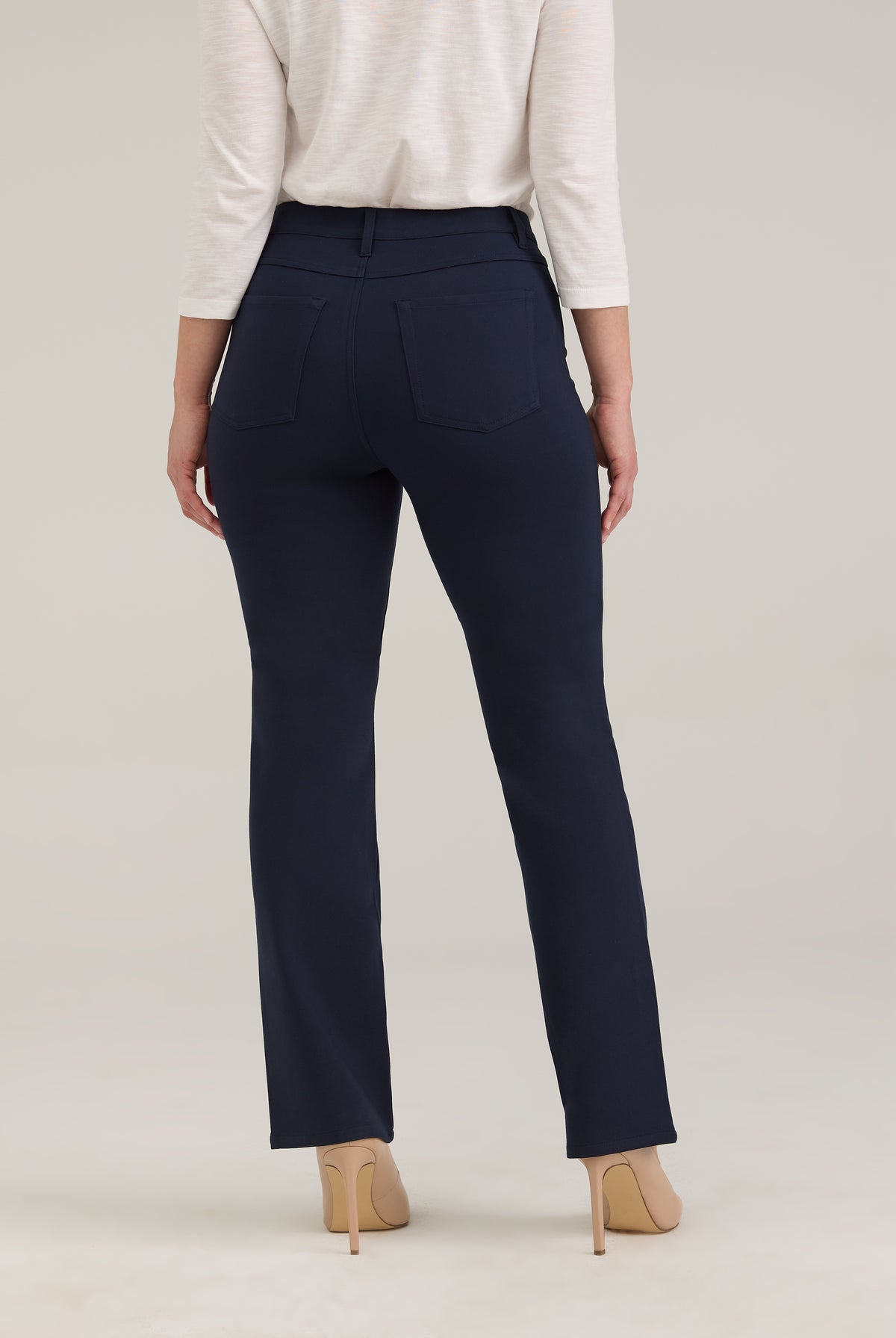 Back view of navy pants with patch pockets and tailored fit by French Dressing Jeans (FDJ)