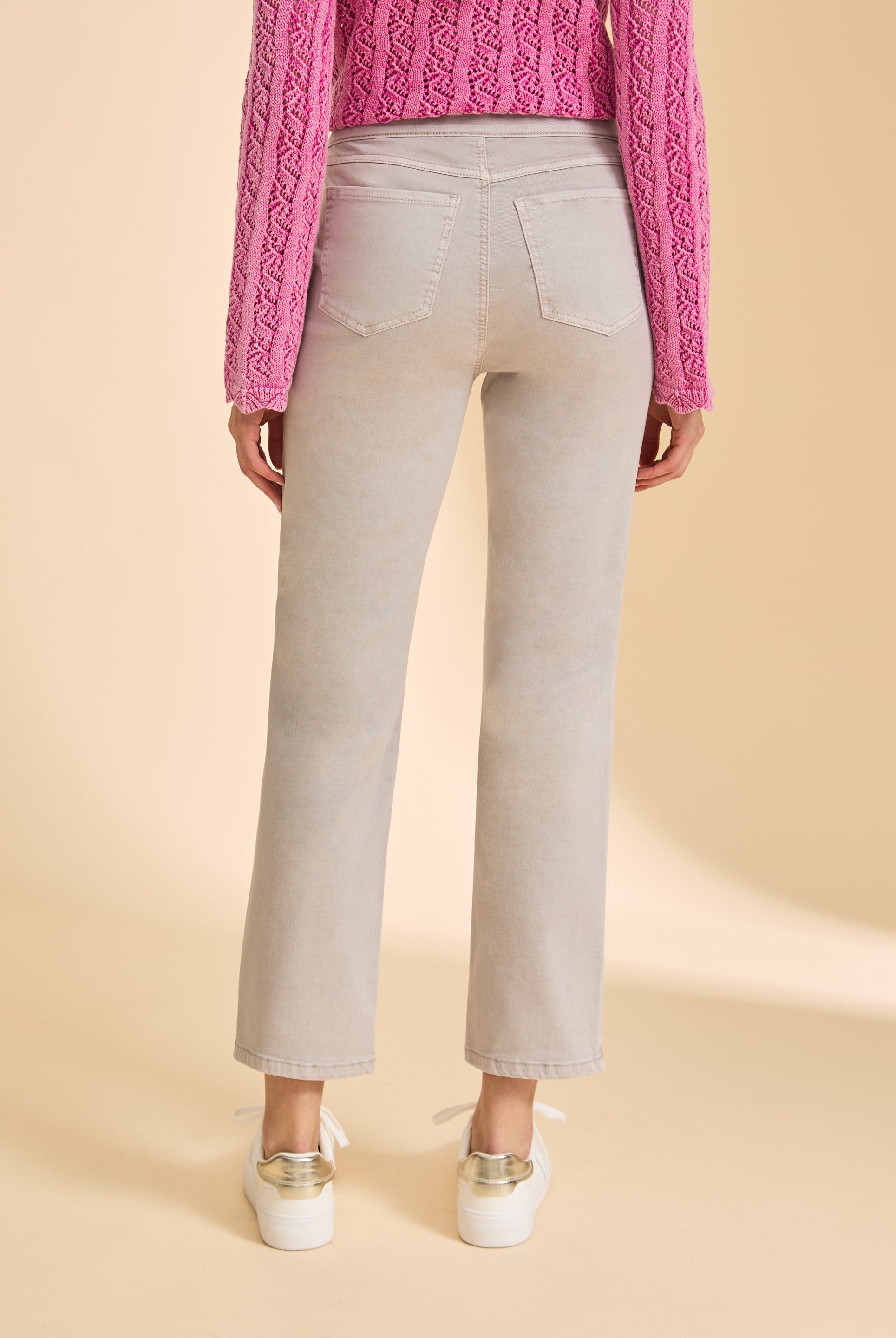 Back view of taupe straight-leg jeans, featuring classic pocket design by French Dressing Jeans (FDJ)