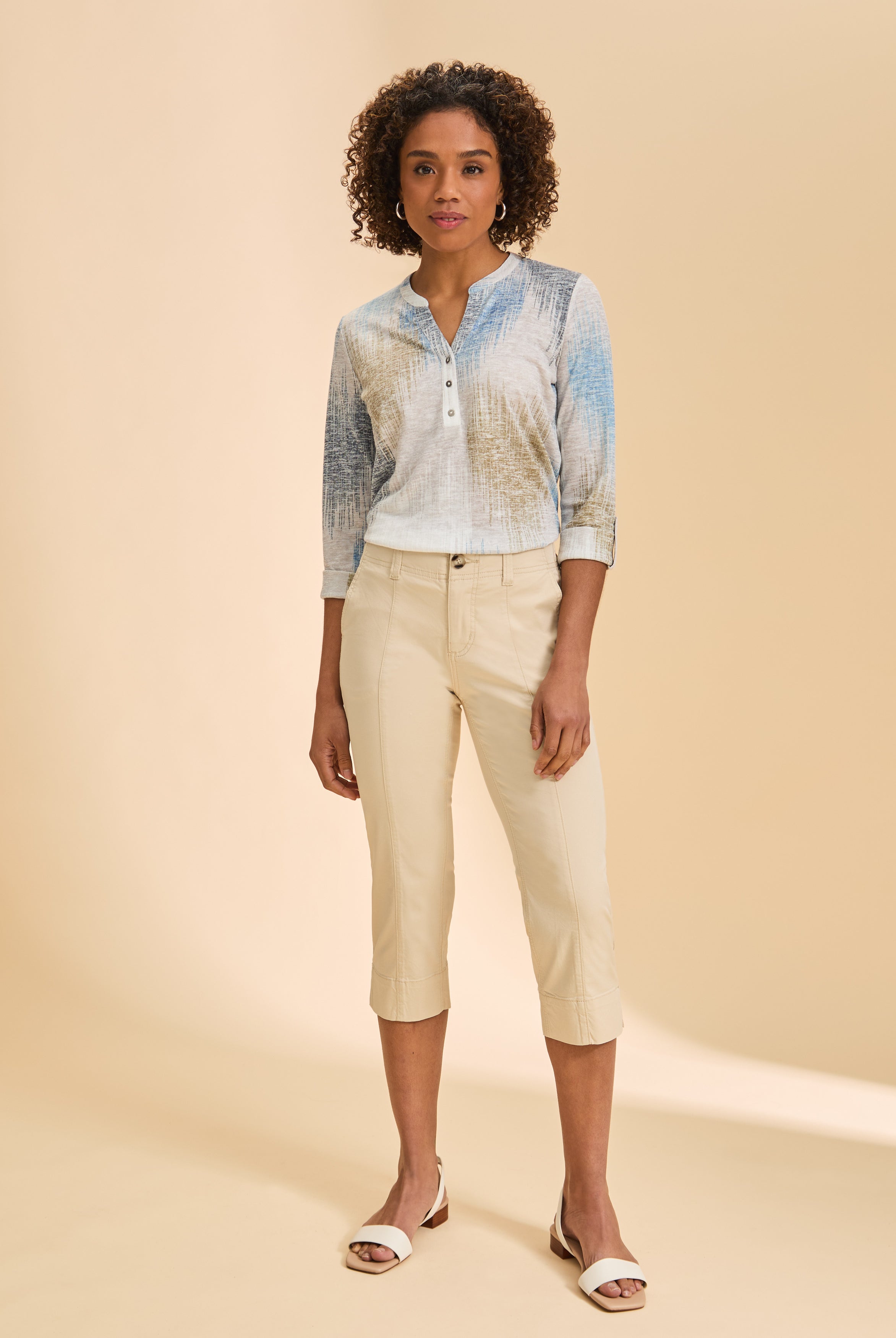 Full view of blue and beige patterned top styled with capri pants by French Dressing Jeans (FDJ)