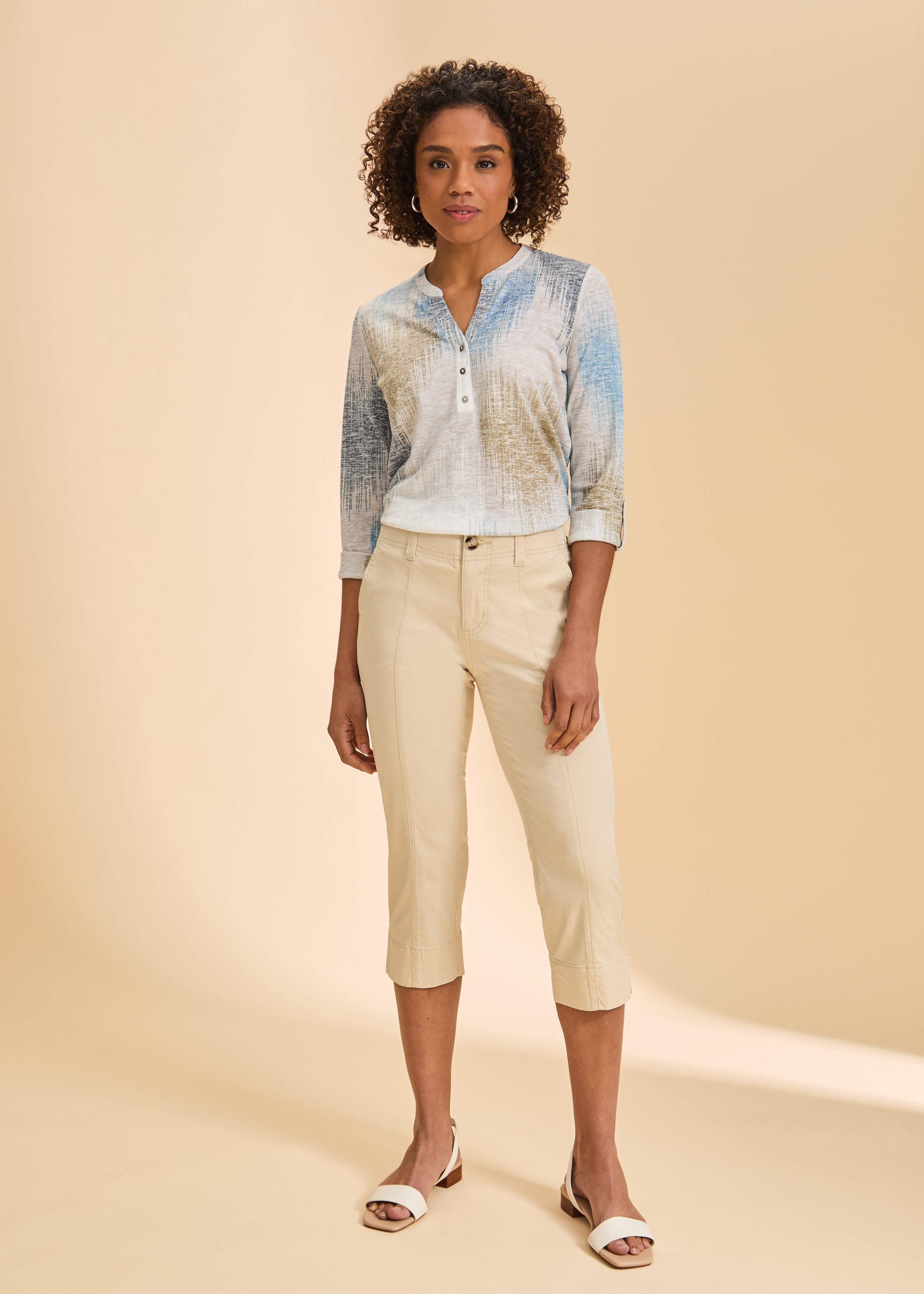 Full view of blue and beige patterned top styled with capri pants by French Dressing Jeans (FDJ)
