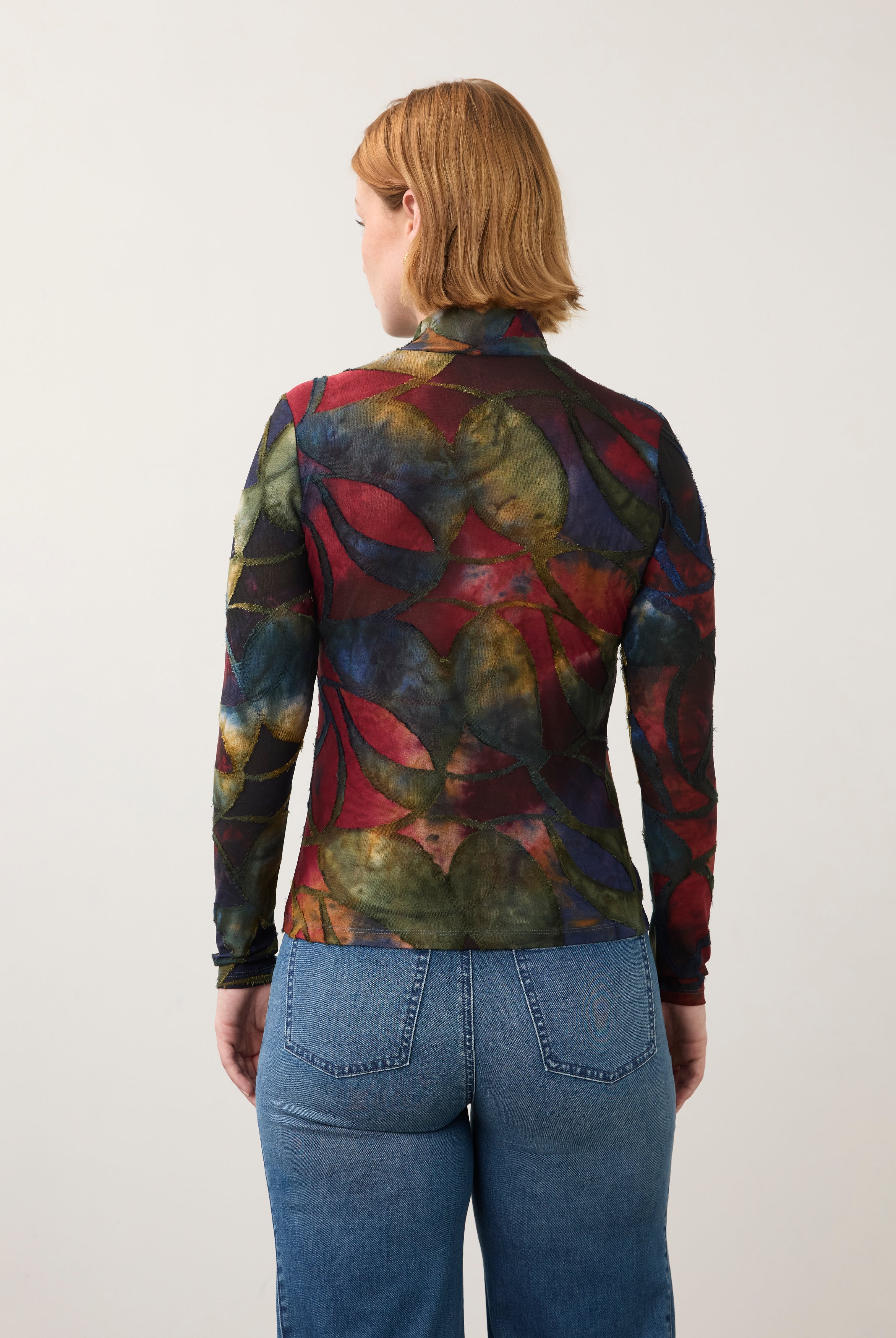 Back view of abstract print top, highlighting seamless design and deep hues by French Dressing Jeans (FDJ)