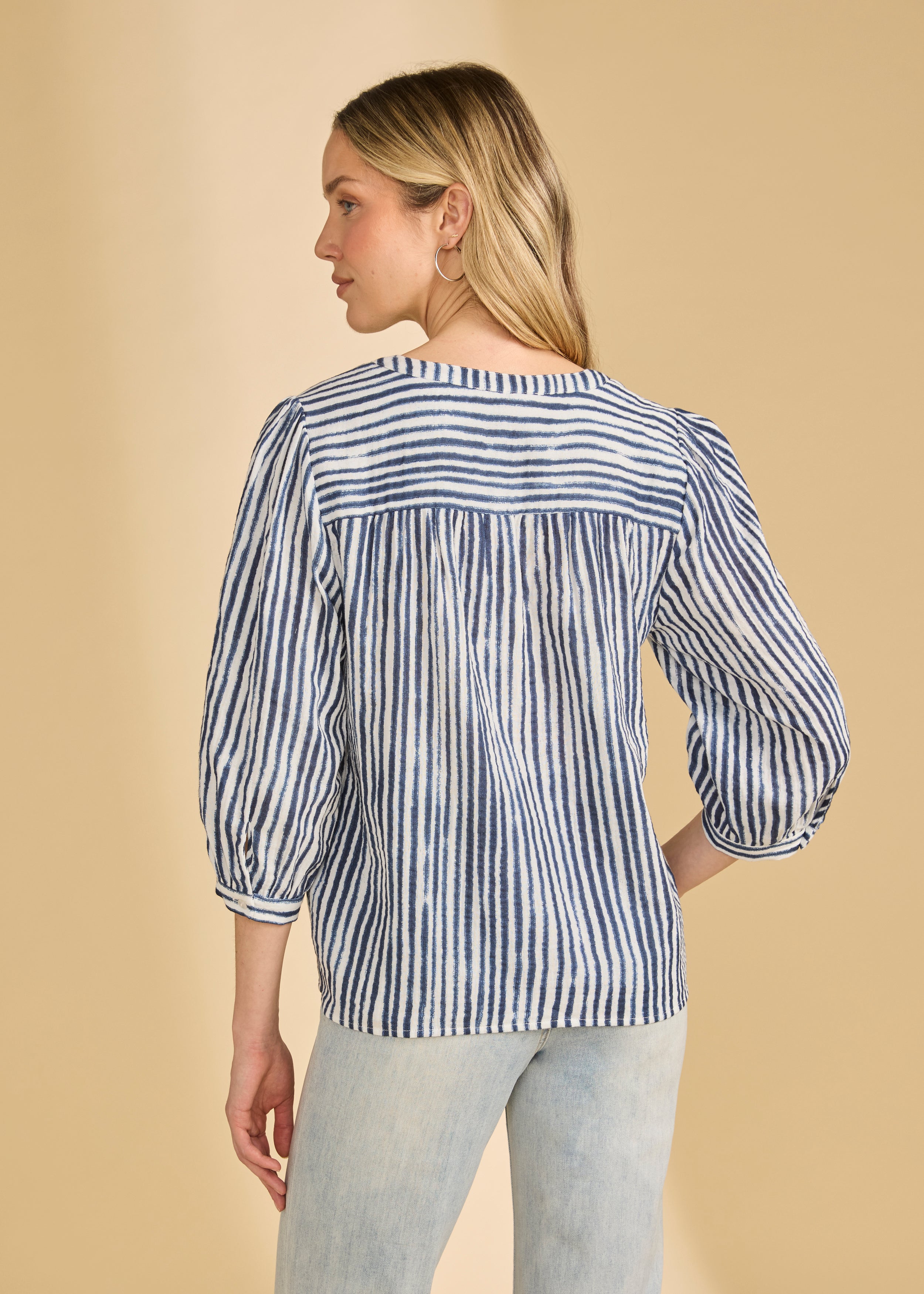 Back view of navy striped blouse with gathered yoke and 3/4 sleeves by French Dressing Jeans (FDJ)
