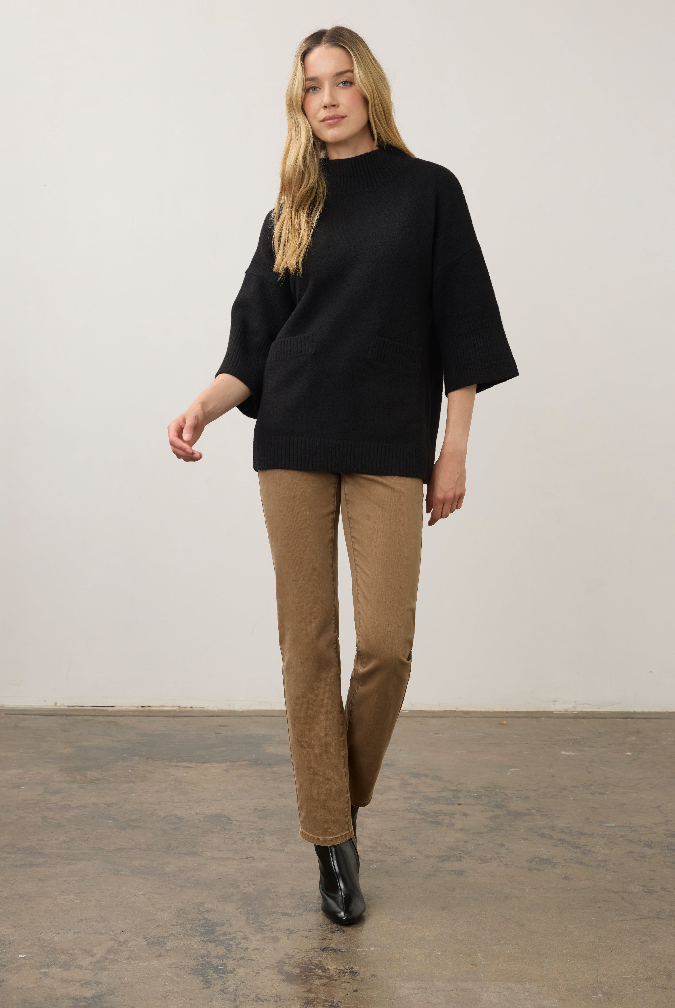 Full view of black tunic sweater with tan pants and boots by French Dressing Jeans (FDJ)