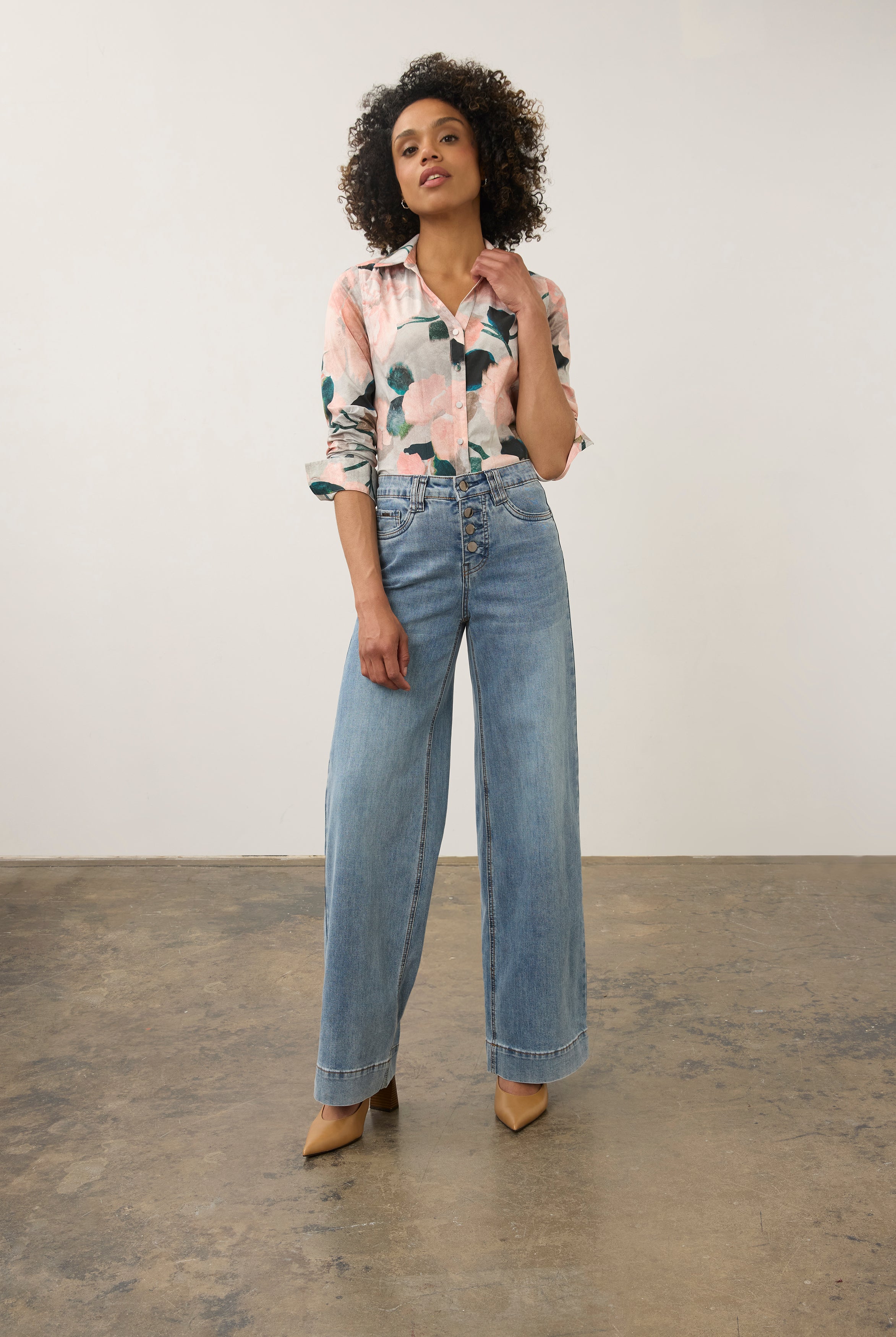 Model in pink floral shirt and denim pants, full body view by French Dressing Jeans (FDJ)