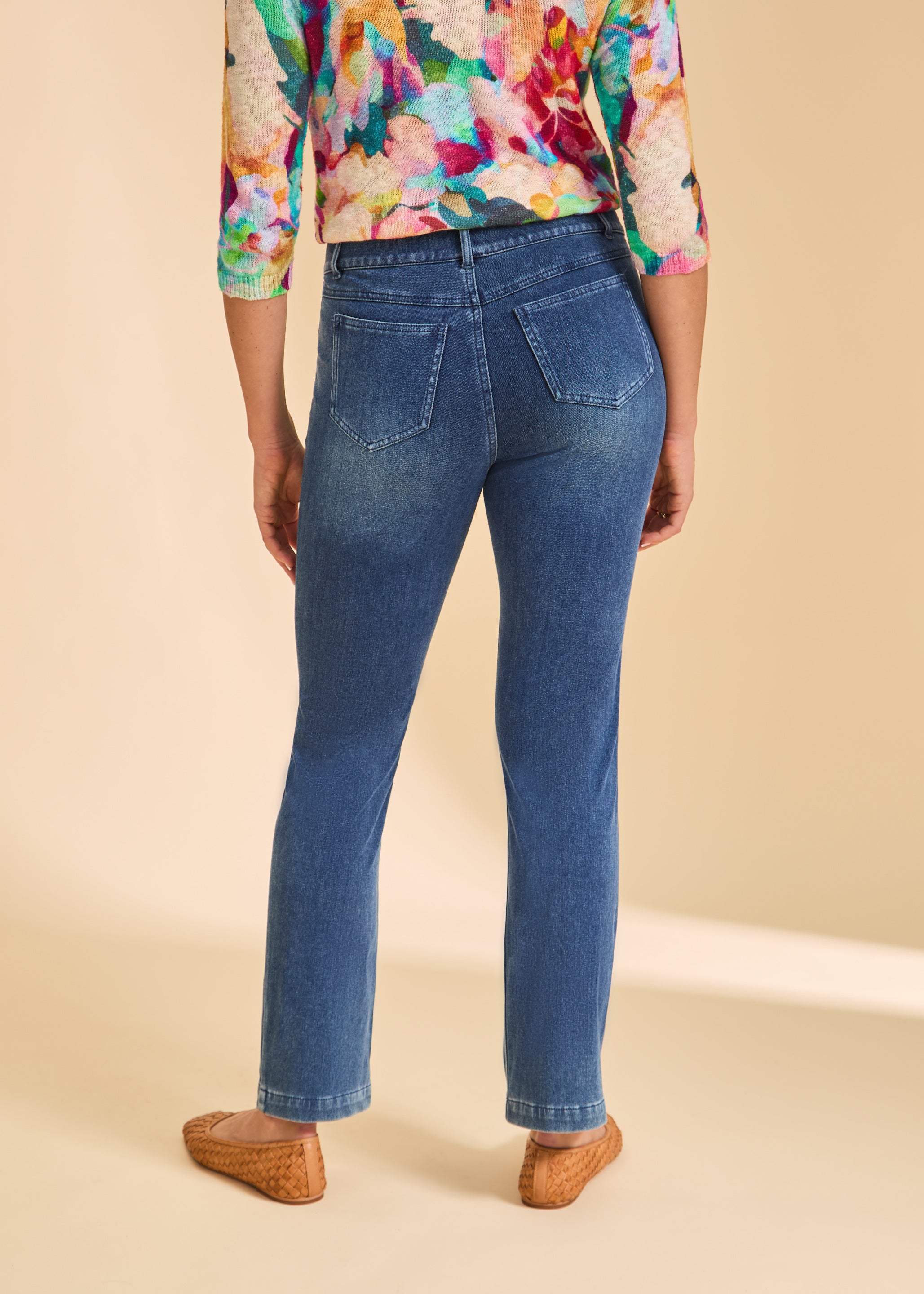 Back view of blue denim straight leg jeans highlighting patch pockets by French Dressing Jeans (FDJ)
