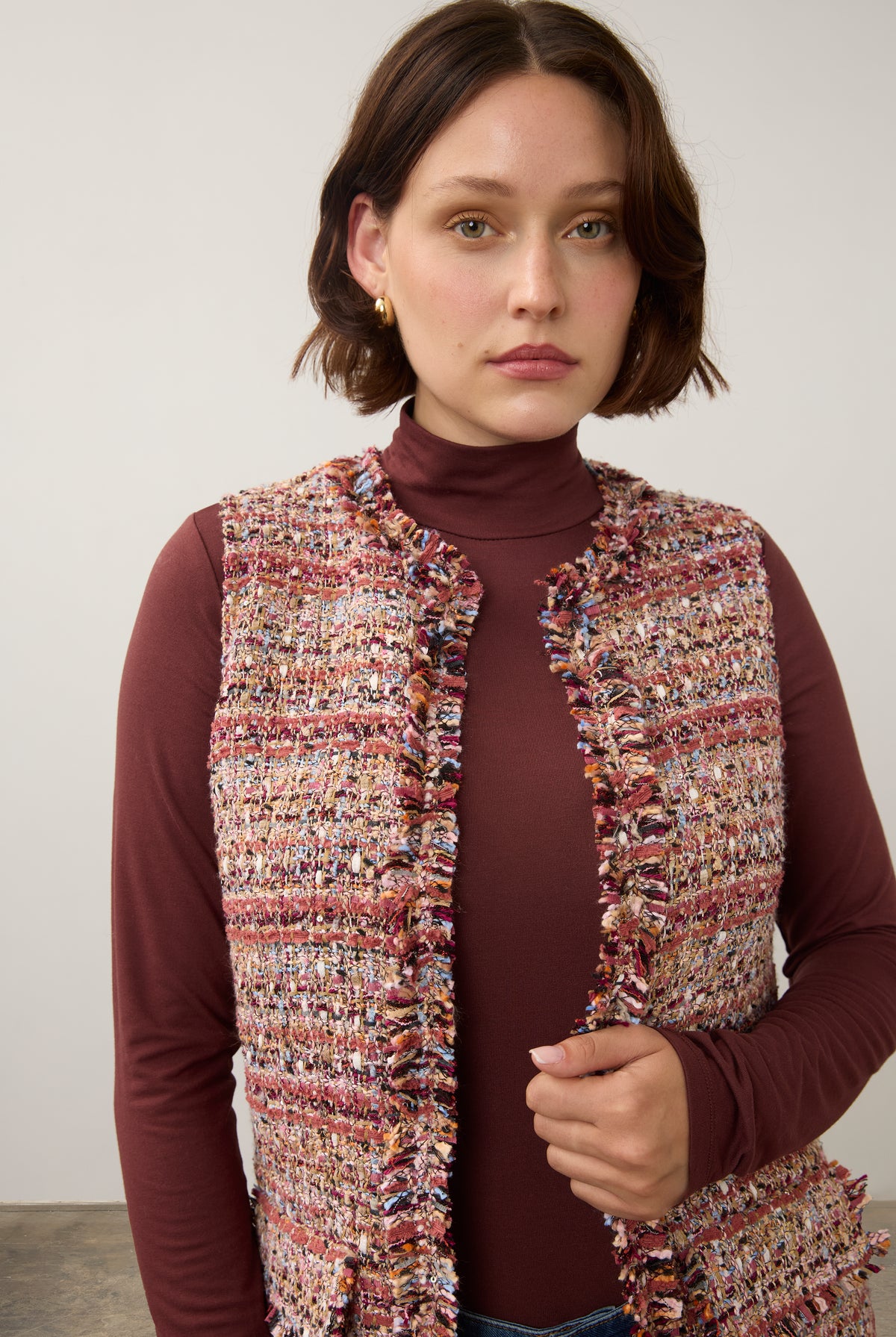 Close-up of multicolored textured vest showing buttonless open front by French Dressing Jeans (FDJ)
