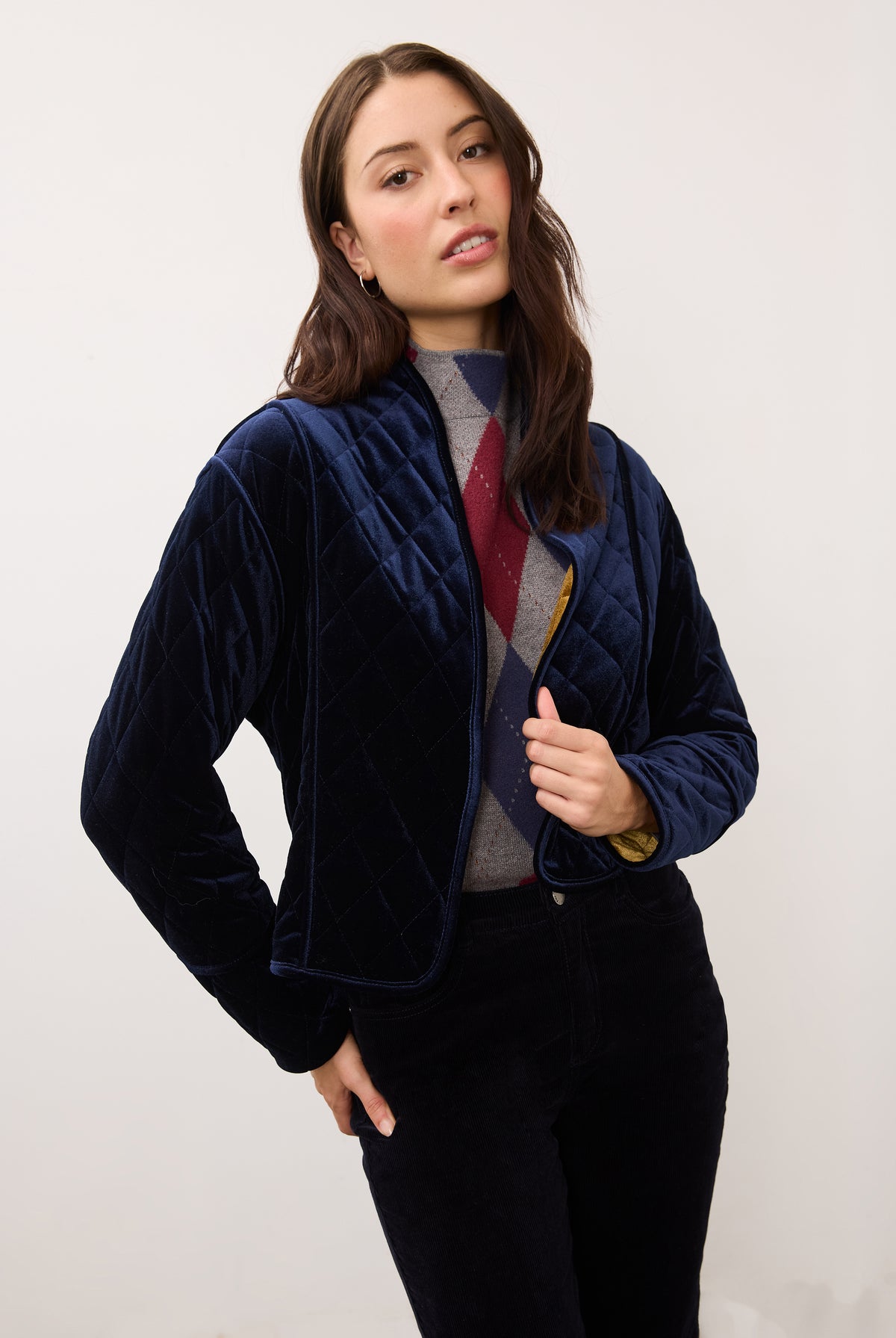 Close-up of blueberry quilted jacket highlighting diagonal stitching and velvet texture by French Dressing Jeans (FDJ)