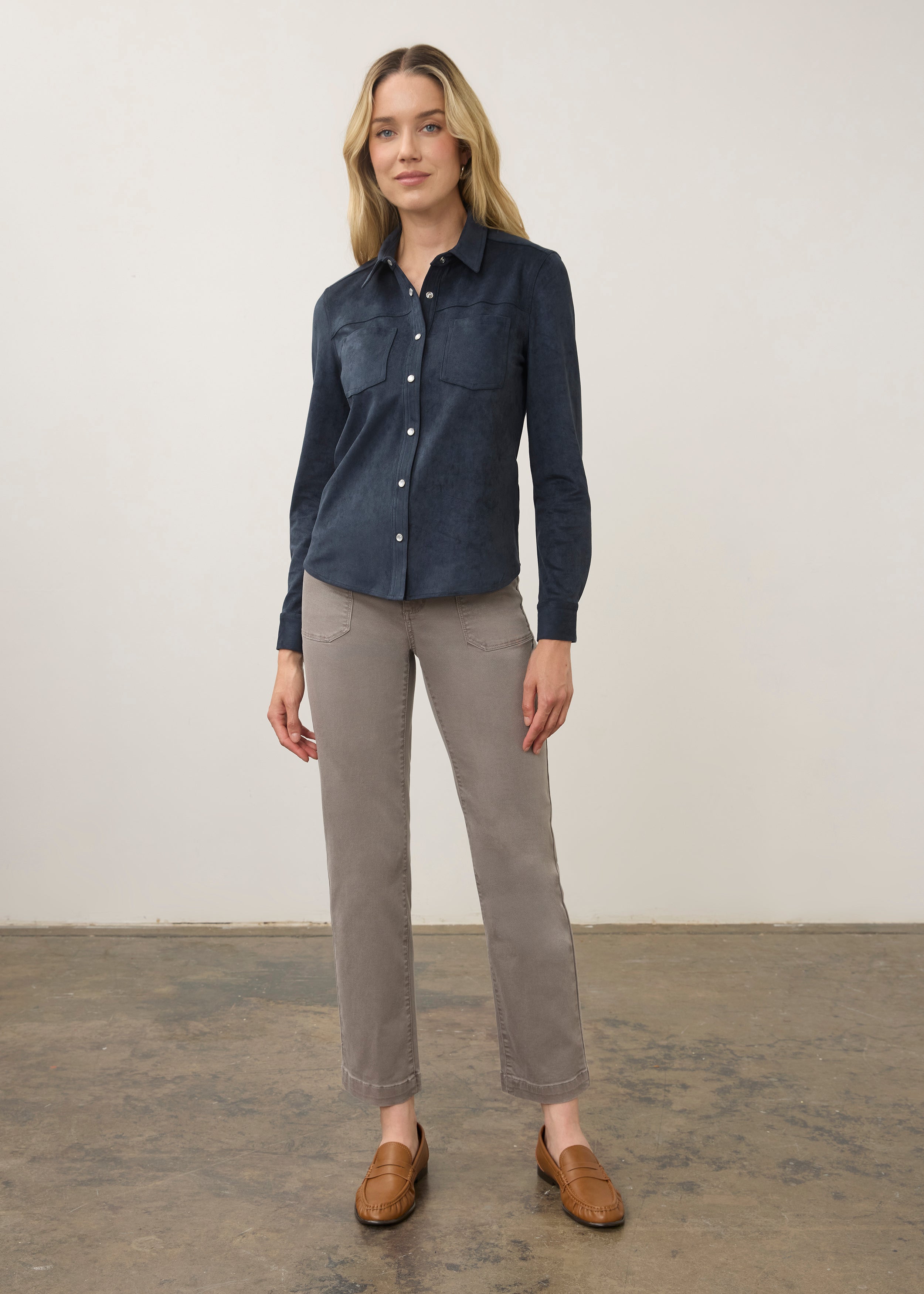 Model in navy suede shirt and grey pants, full body view by French Dressing Jeans (FDJ)