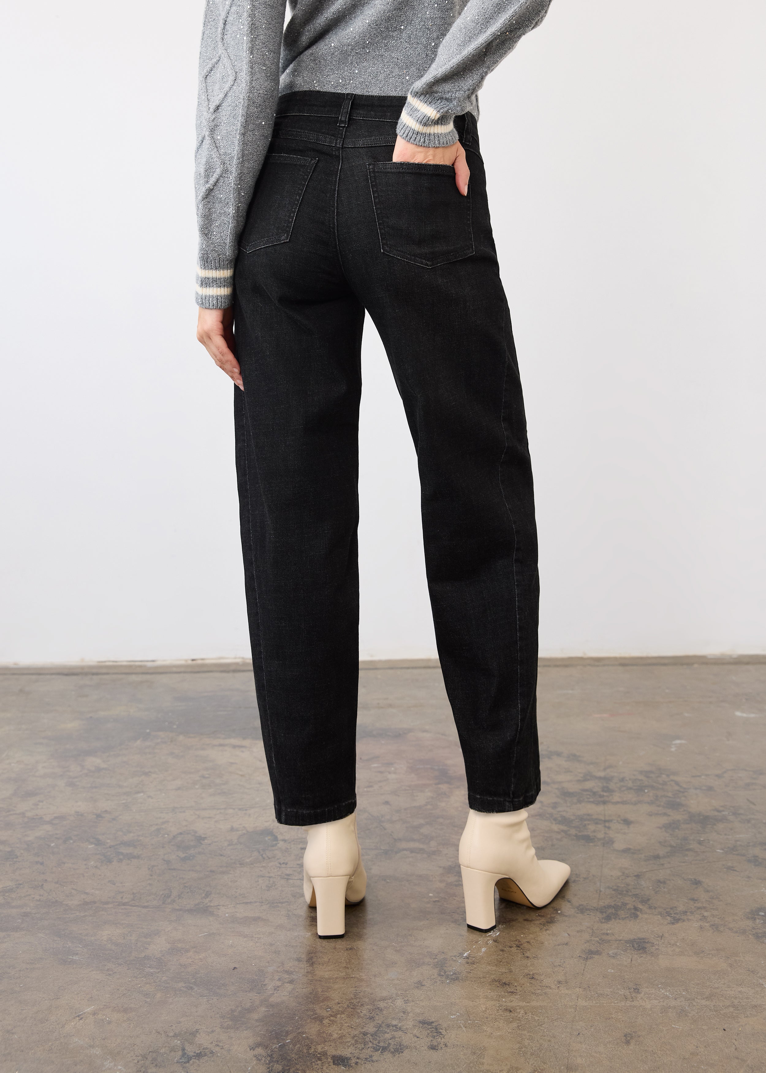 Back view of black denim showcasing patch pockets and relaxed fit by French Dressing Jeans (FDJ)