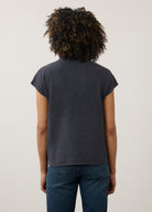 Back view of navy ribbed top with high collar and seamless design by French Dressing Jeans (FDJ)