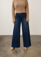 Front view of dark rinse wide-leg jeans with front patch pockets by French Dressing Jeans (FDJ)
