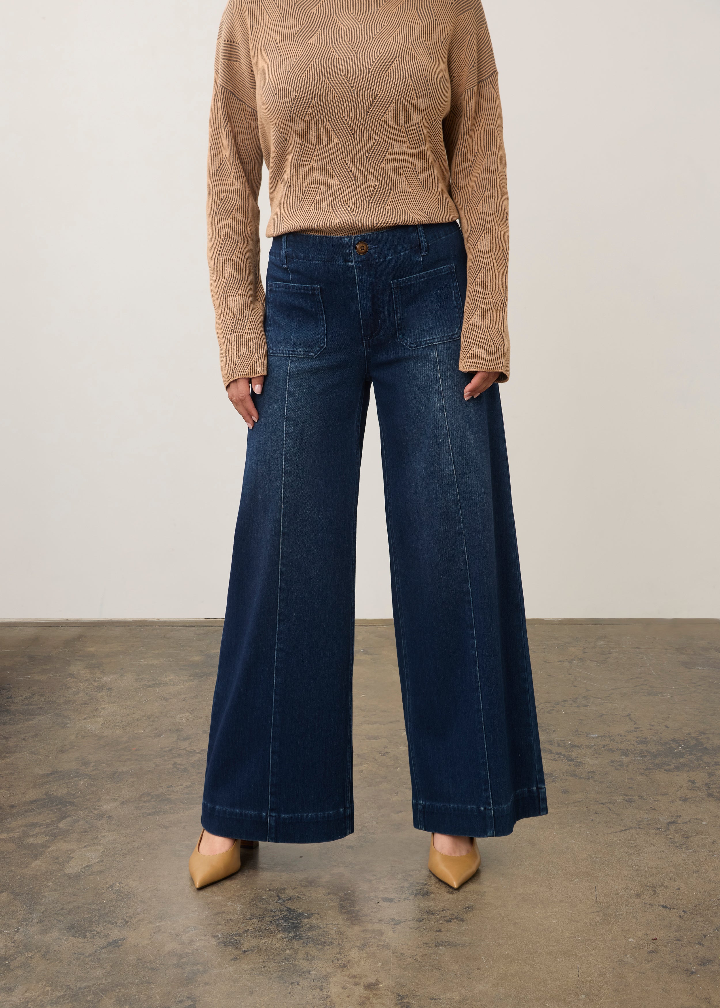 Front view of dark rinse wide-leg jeans with front patch pockets by French Dressing Jeans (FDJ)
