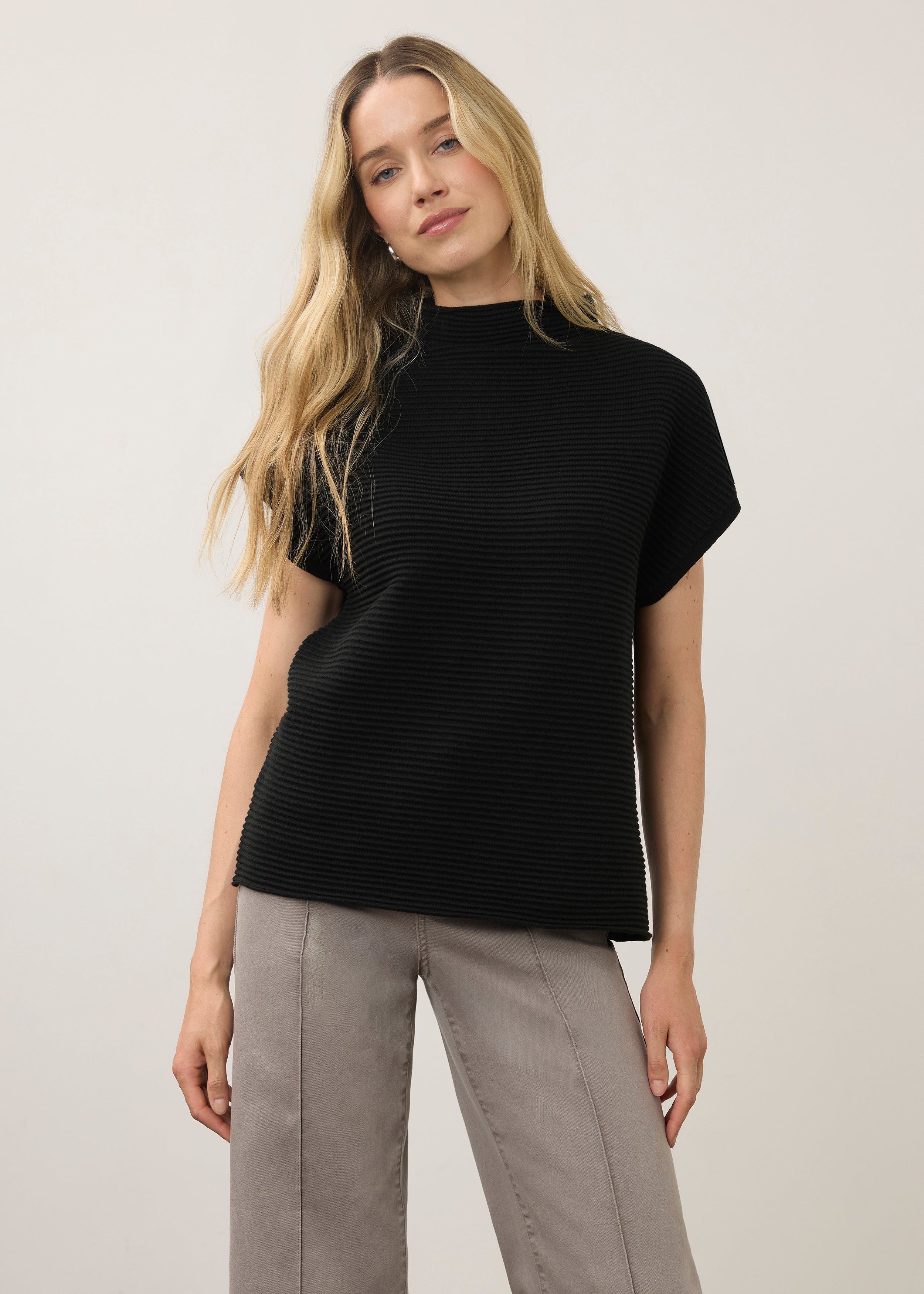 Front view of black short sleeve top with ribbed texture and high collar by French Dressing Jeans (FDJ)