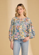 Front view of Ambush Floral blouse highlighting V-neck and balloon sleeves by French Dressing Jeans (FDJ)
