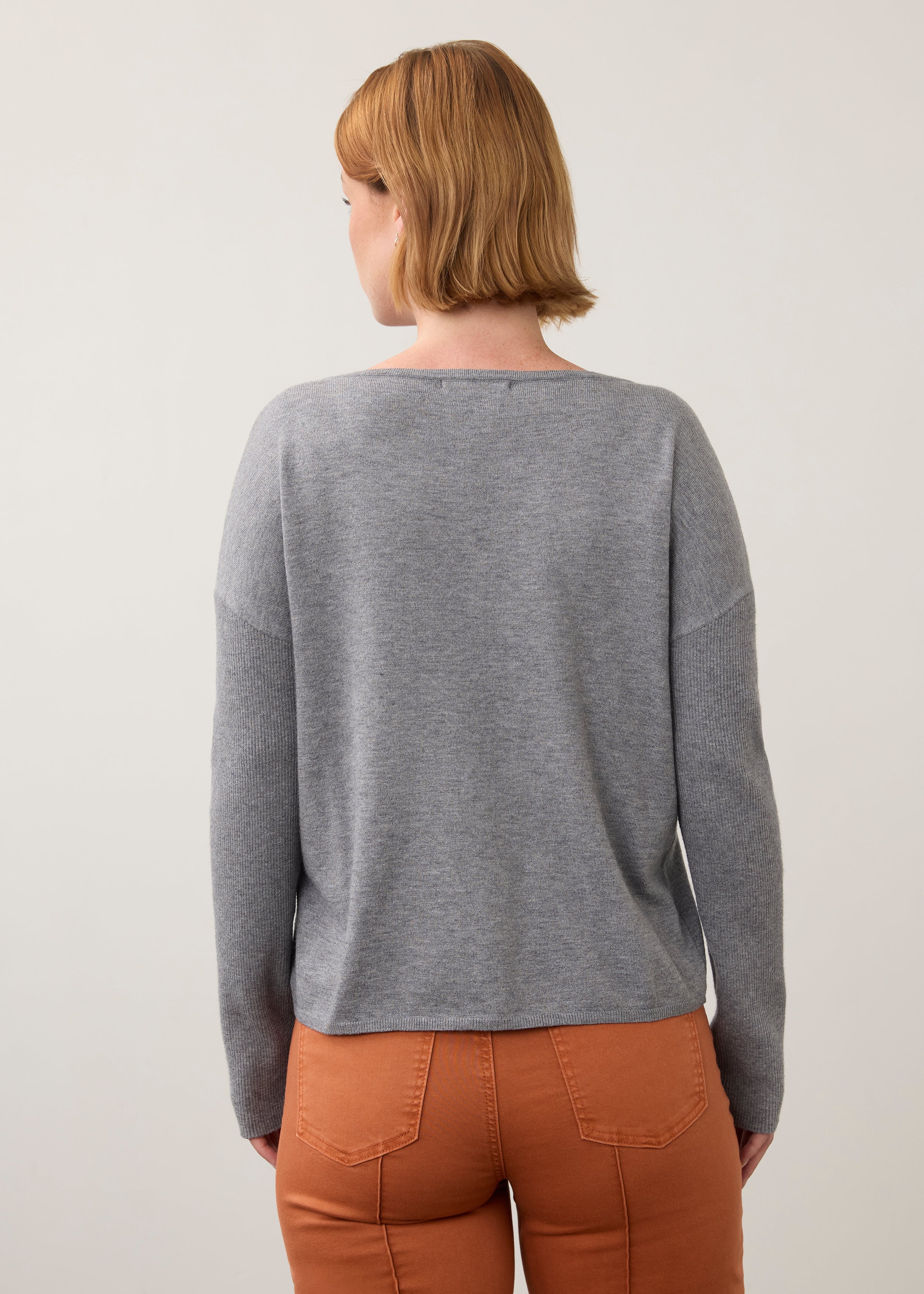 Back view of grey sweater highlighting relaxed fit by French Dressing Jeans (FDJ)