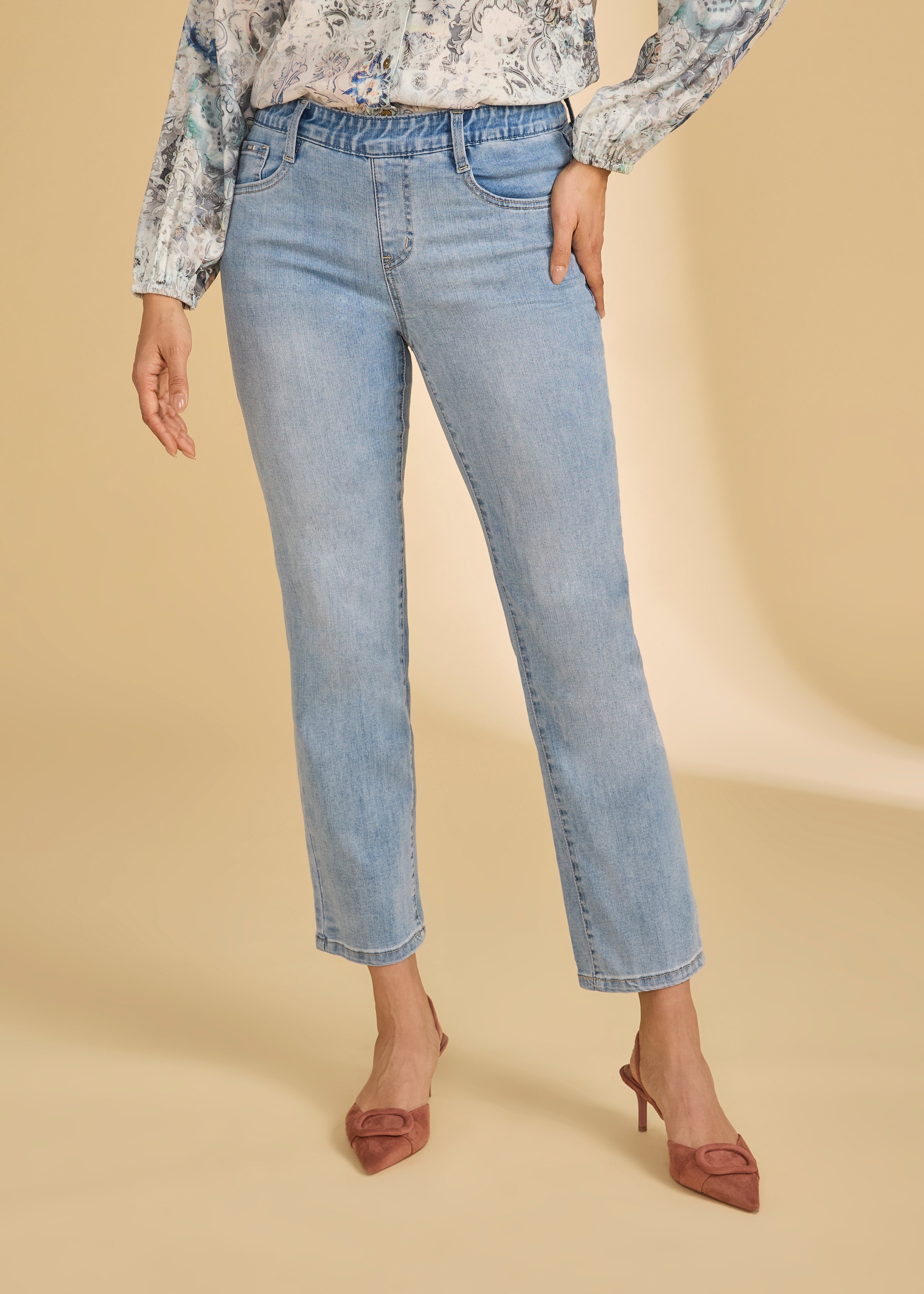 Front view of light medium pull-on ankle jeans with a classic fit and printed blouse by French Dressing Jeans (FDJ)