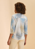Back view of blue and beige patterned top highlighting fabric print by French Dressing Jeans (FDJ)