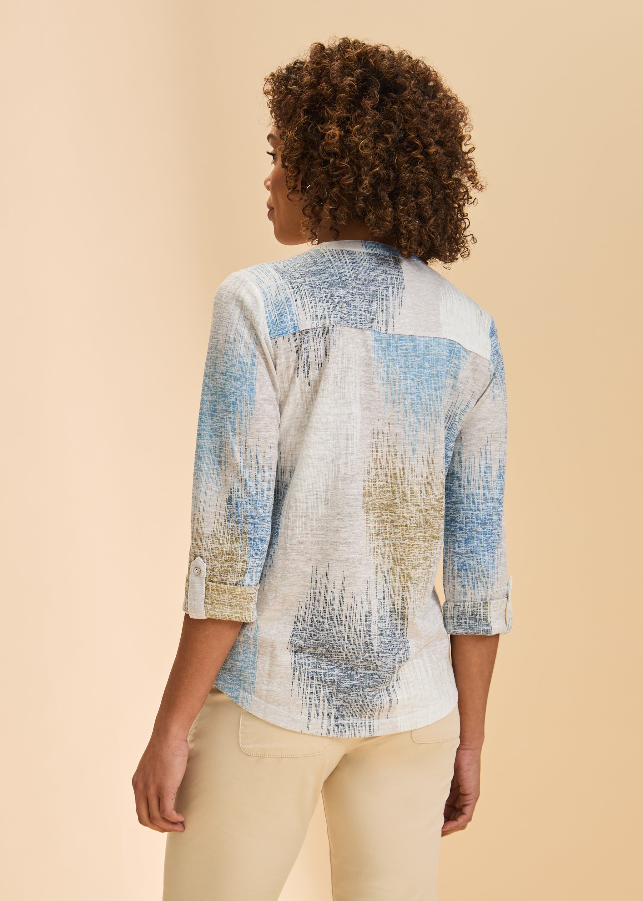 Back view of blue and beige patterned top highlighting fabric print by French Dressing Jeans (FDJ)