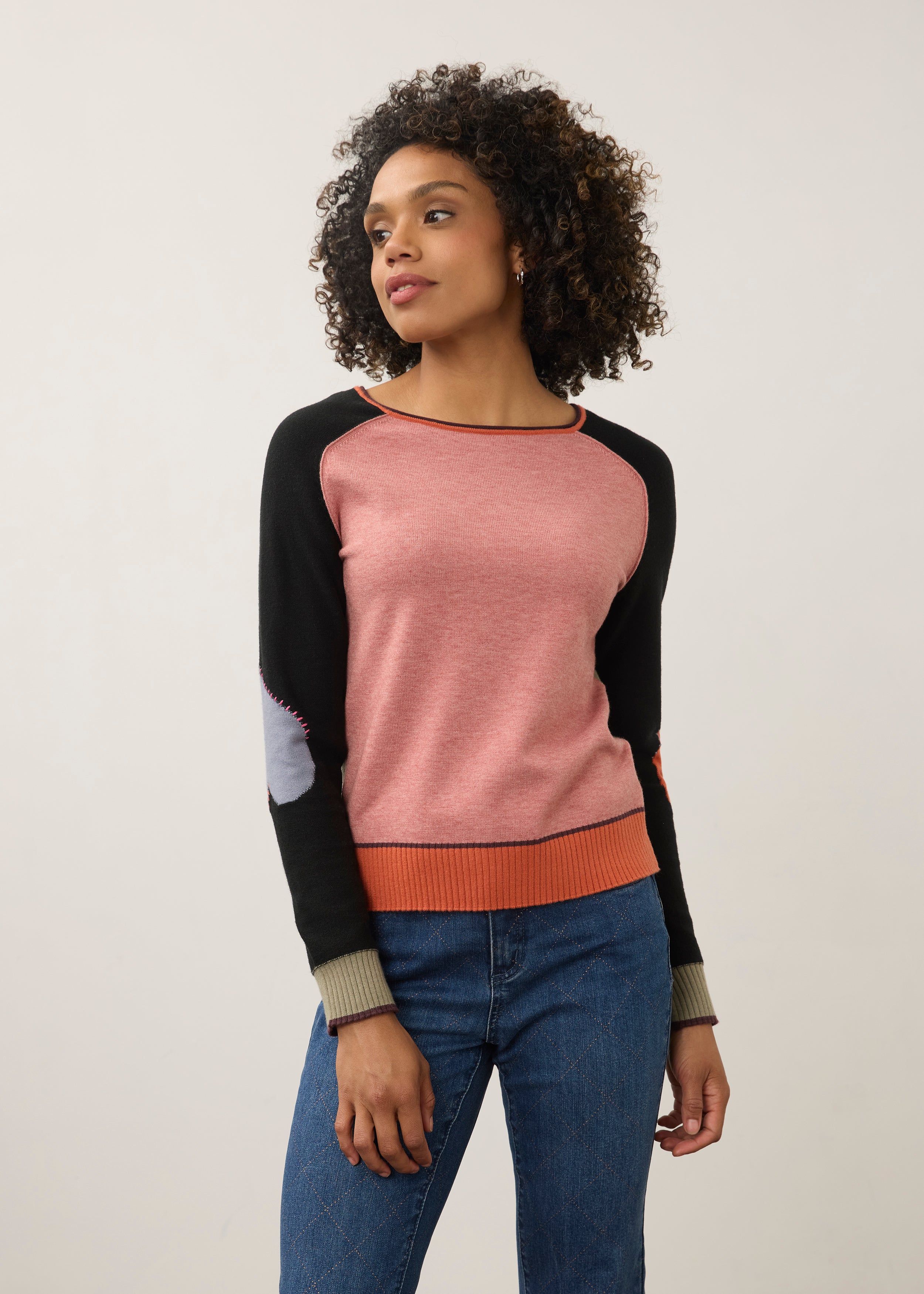 Front view of pink and black colorblock sweater with long sleeves by French Dressing Jeans (FDJ)