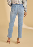 Back view of light medium pull-on ankle jeans showing patch pockets and straight leg by French Dressing Jeans (FDJ)
