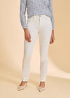 Close-up front view of white straight-leg jeans, showcasing sleek lines by French Dressing Jeans (FDJ)