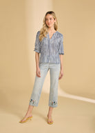 Full body view of navy striped blouse styled with jeans for a casual look by French Dressing Jeans (FDJ)