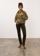 Full view of olive jacket and pants ensemble with pointed heels by French Dressing Jeans (FDJ)