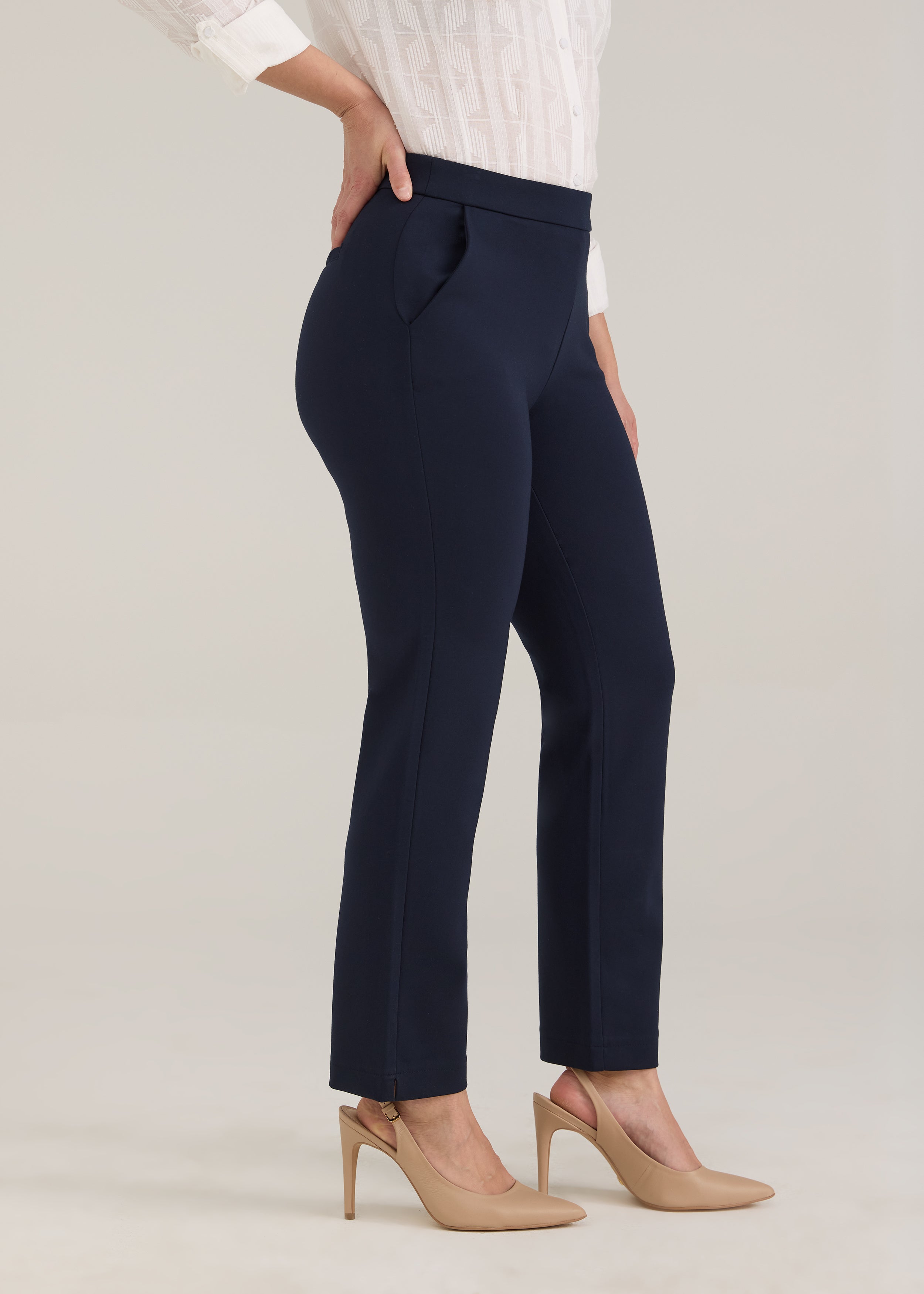 Side profile of navy pants highlighting straight ankle silhouette and front pockets by French Dressing Jeans (FDJ)