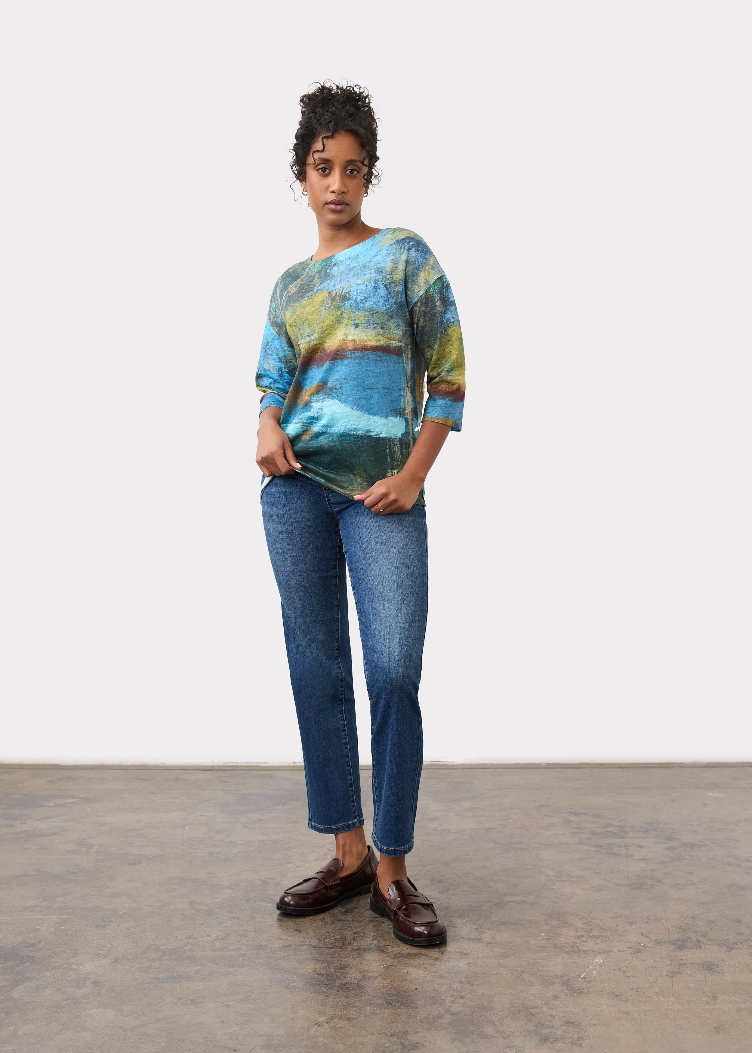Full body view of blue abstract print top with jeans and loafers by French Dressing Jeans (FDJ)