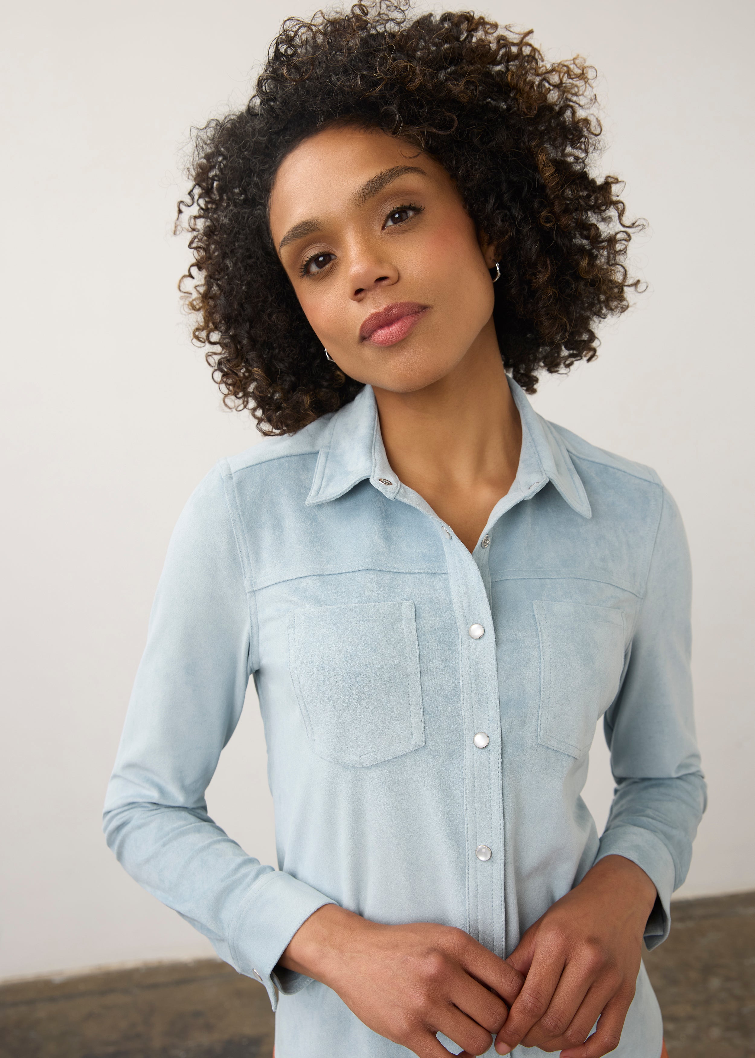 Close-up of light blue suede shirt highlighting button details by French Dressing Jeans (FDJ)