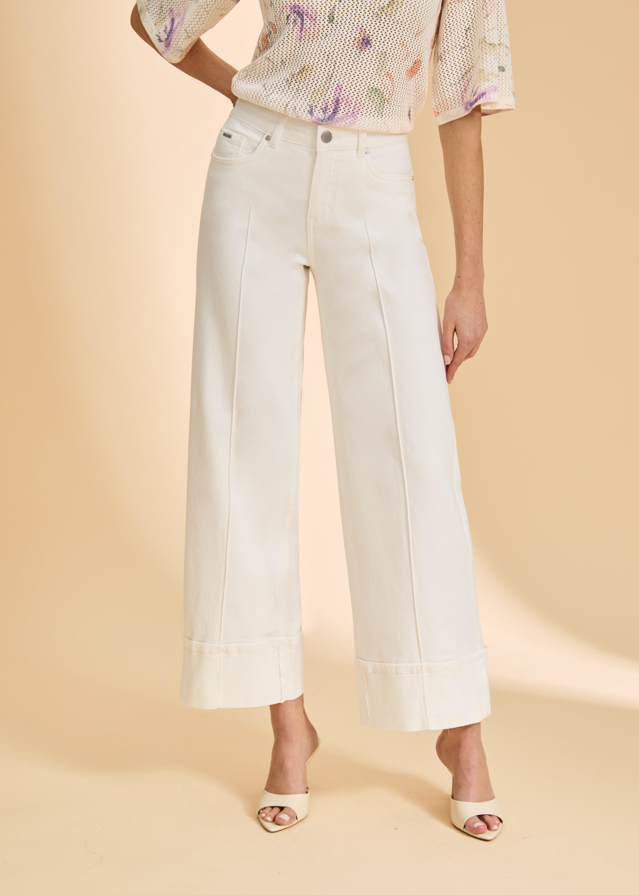 Close-up of seam detailing on white wide-leg jeans by French Dressing Jeans (FDJ)