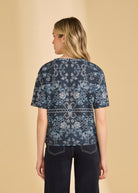Back view of blue Polynesian block print top highlighting detailed pattern and relaxed fit by French Dressing Jeans (FDJ)