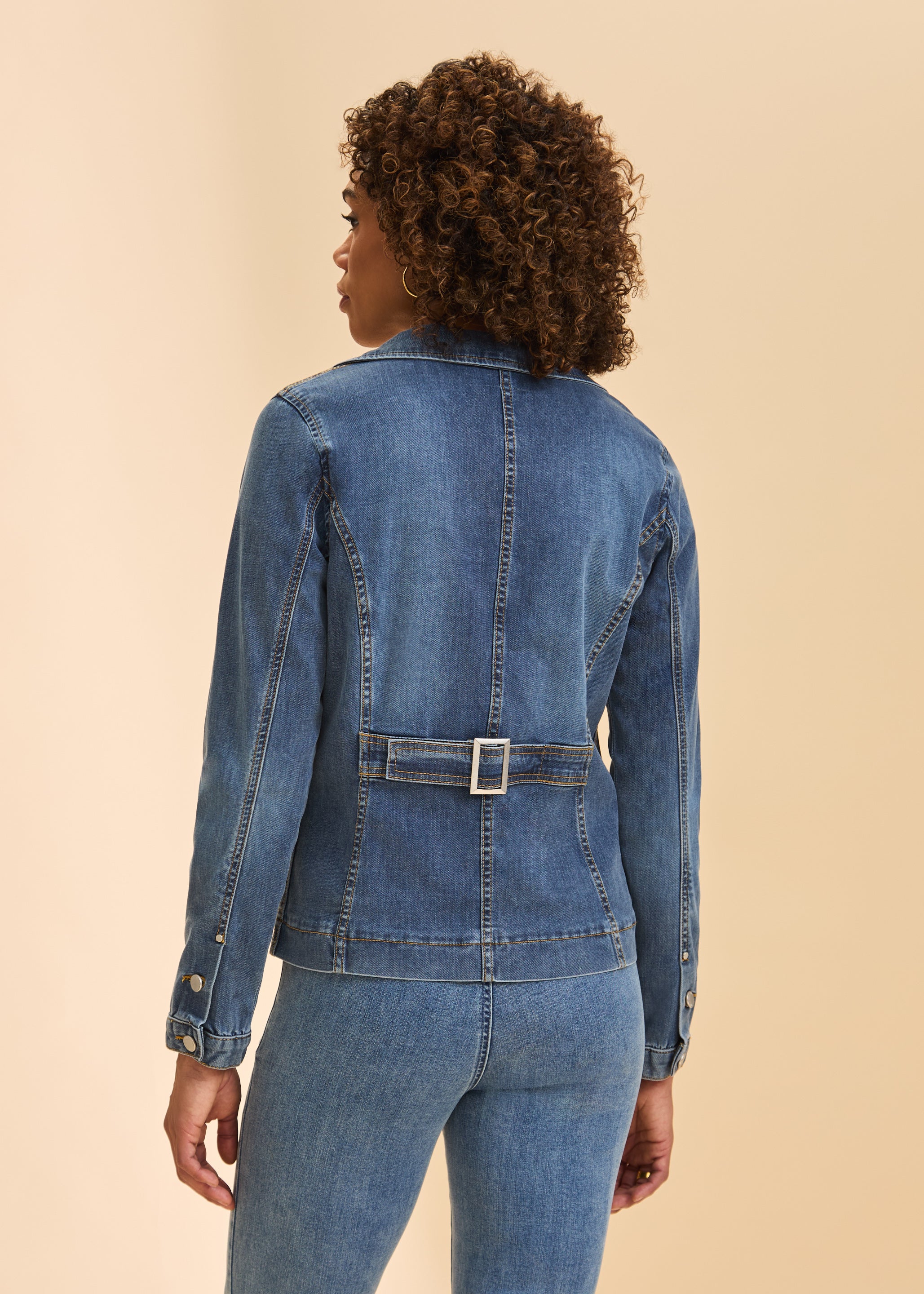 Back view of denim blazer jacket highlighting belt detail and seam lines by French Dressing Jeans (FDJ)