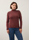 Front view of burgundy long sleeve turtleneck top with rich color and sleek fit by French Dressing Jeans (FDJ)