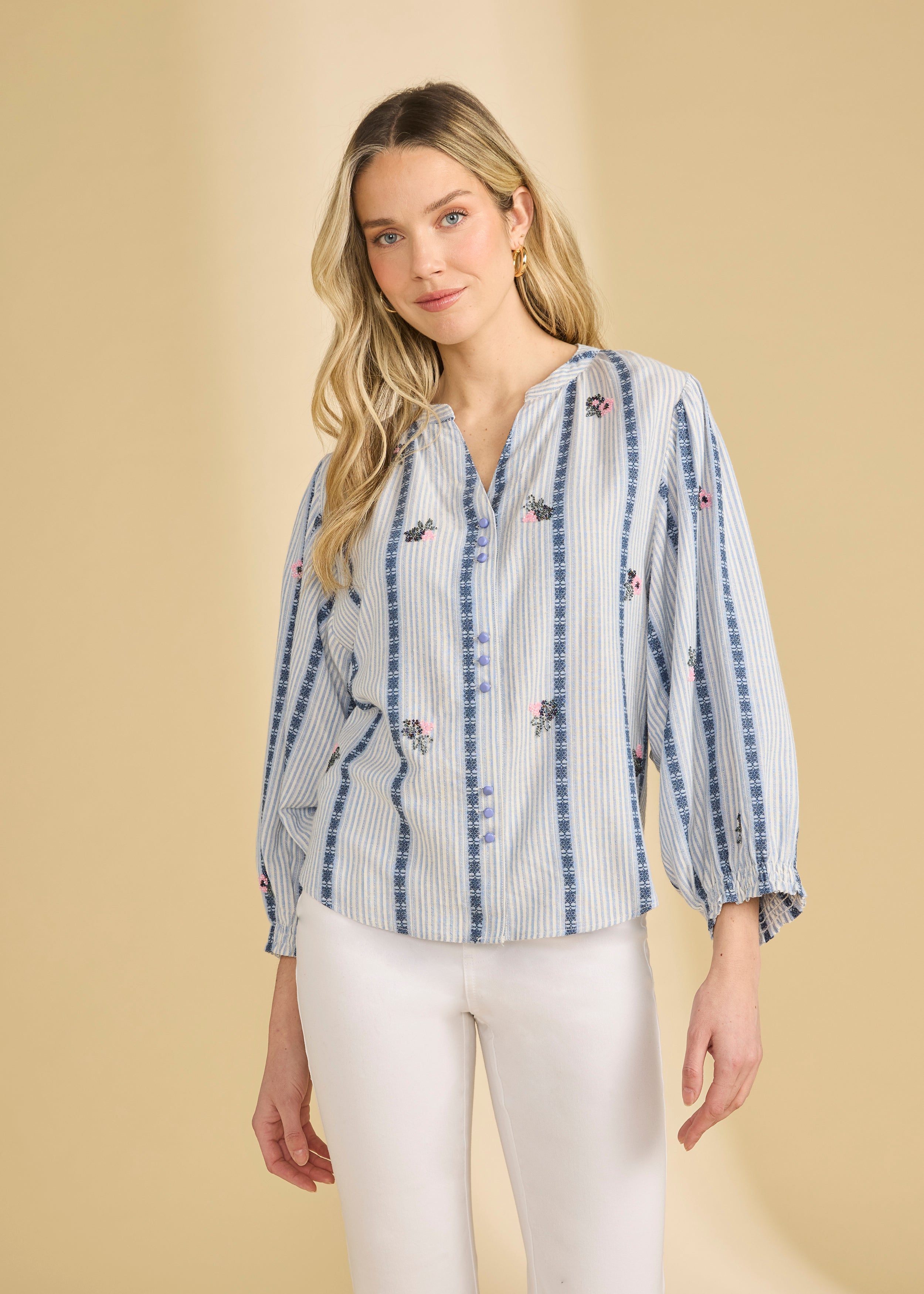 Front view of striped shirt with floral accents and button-up design indoors by French Dressing Jeans (FDJ)