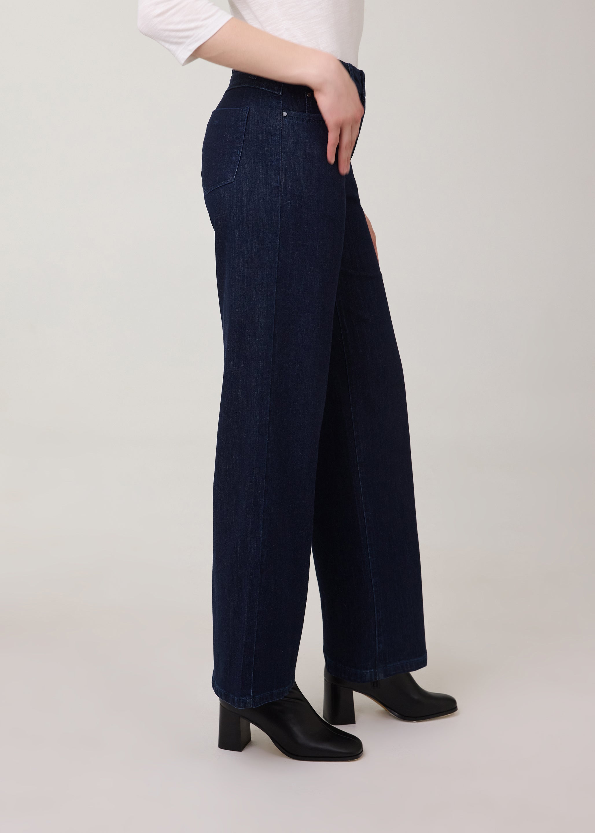 Side profile of dark wide-leg jeans in Delight color by French Dressing Jeans (FDJ)