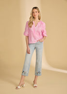 Full look of pink striped blouse with jeans, showing casual elegance by French Dressing Jeans (FDJ)