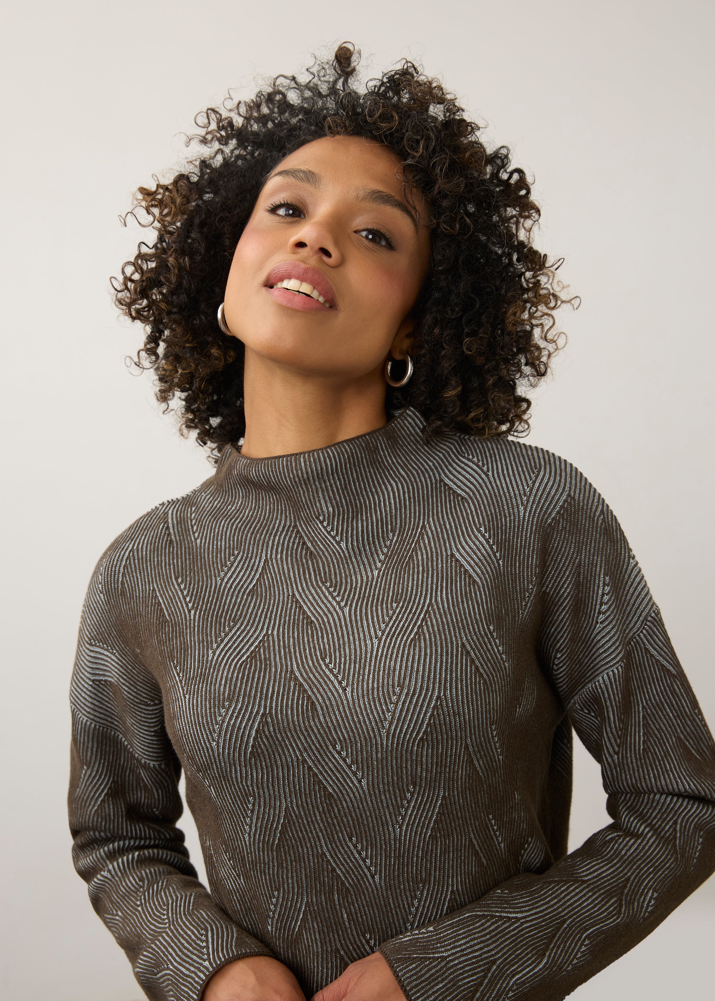 Close-up of brown textured top with high collar detail by French Dressing Jeans (FDJ)
