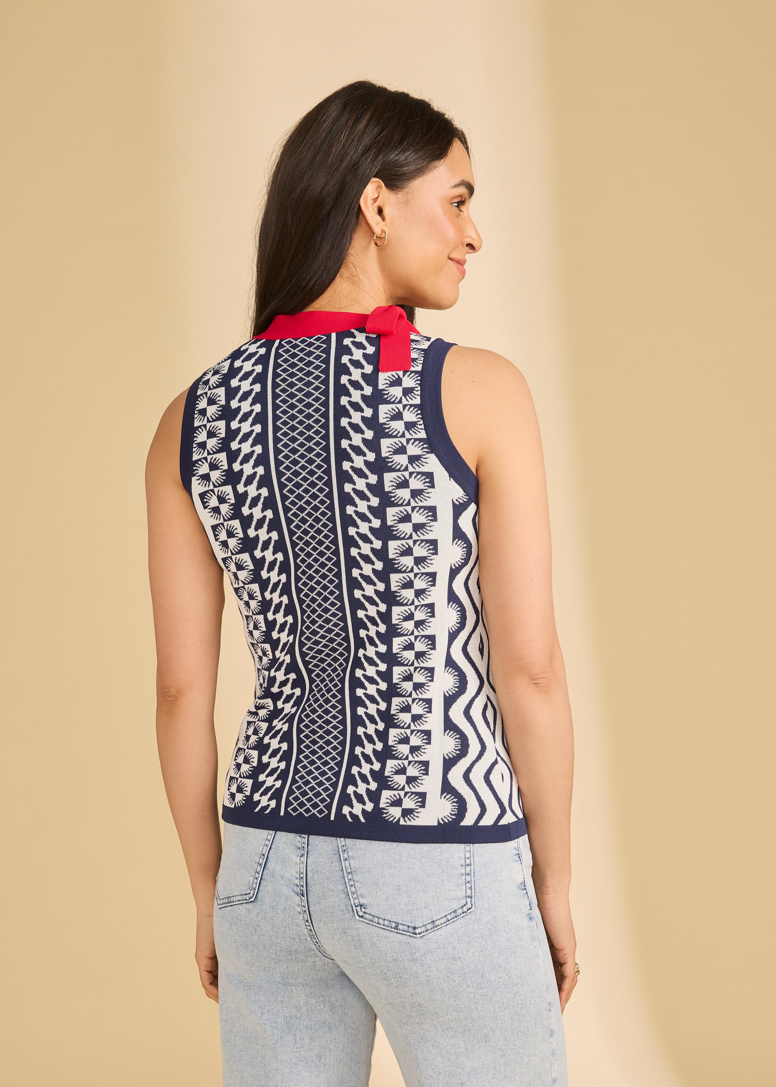 Back view of navy sleeveless top with detailed pattern and red collar by French Dressing Jeans (FDJ)