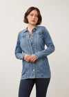 Front view of long denim jacket in medium wash with button closure and side seam pockets by French Dressing Jeans (FDJ) par French Dressing Jeans (FDJ)