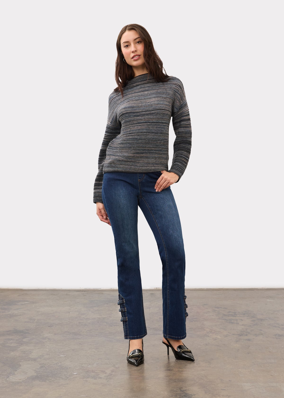Full body view in dark blue denim with straight ankle cut and button accents by French Dressing Jeans (FDJ)
