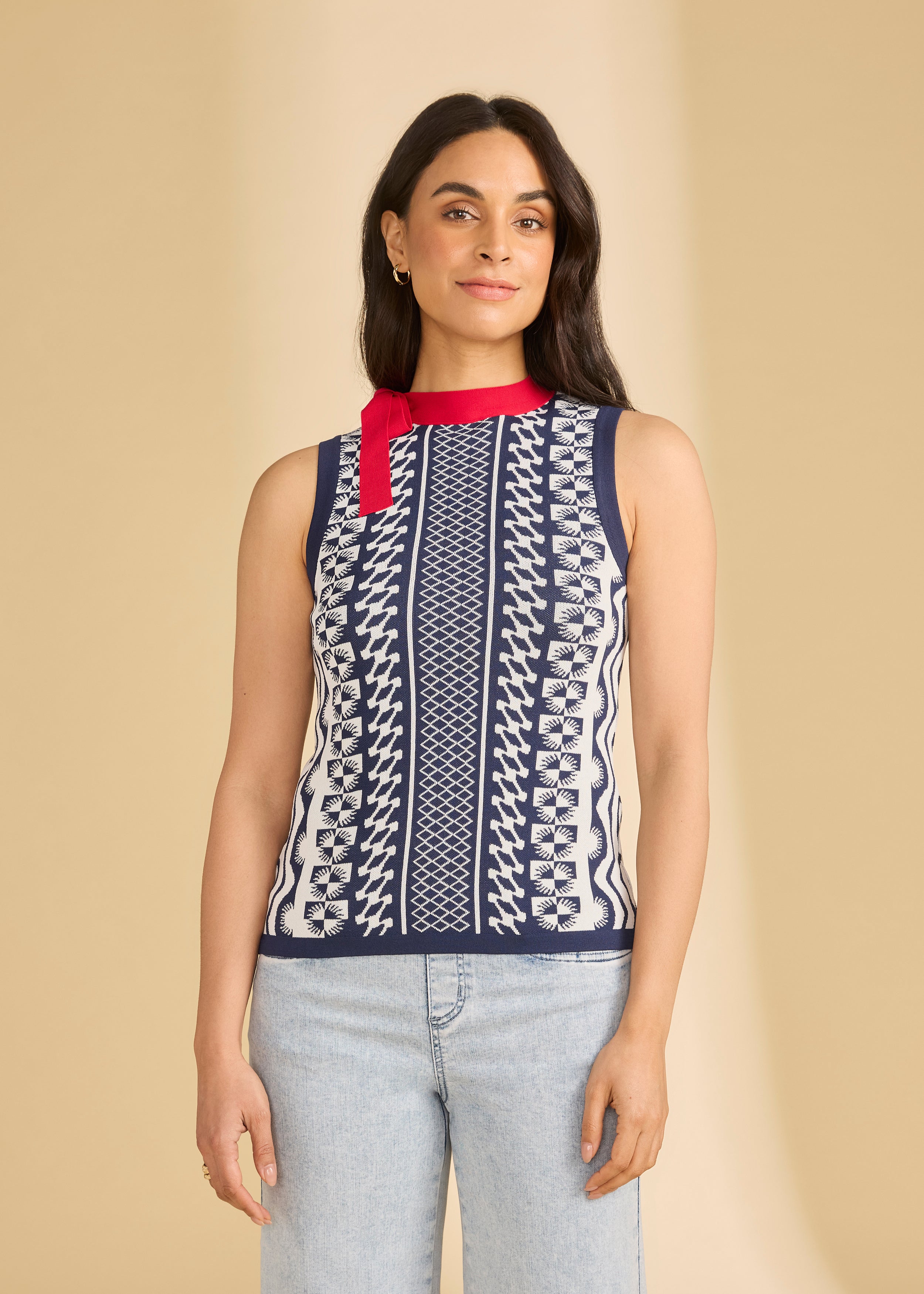 Front view of navy sleeveless top with intricate patterns and red neckline by French Dressing Jeans (FDJ)
