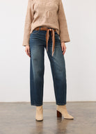 Front view of medium blue jeans with mid-rise waist, styled with a belt by French Dressing Jeans (FDJ)