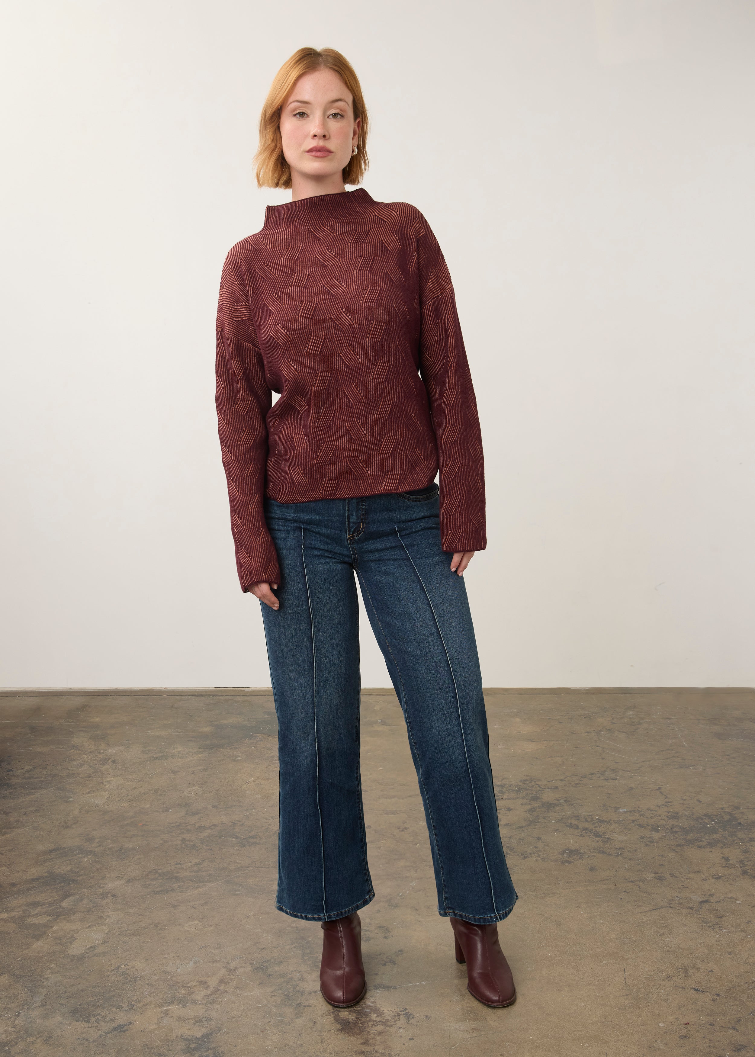 Model wearing burgundy patterned top with jeans, full outfit view by French Dressing Jeans (FDJ)