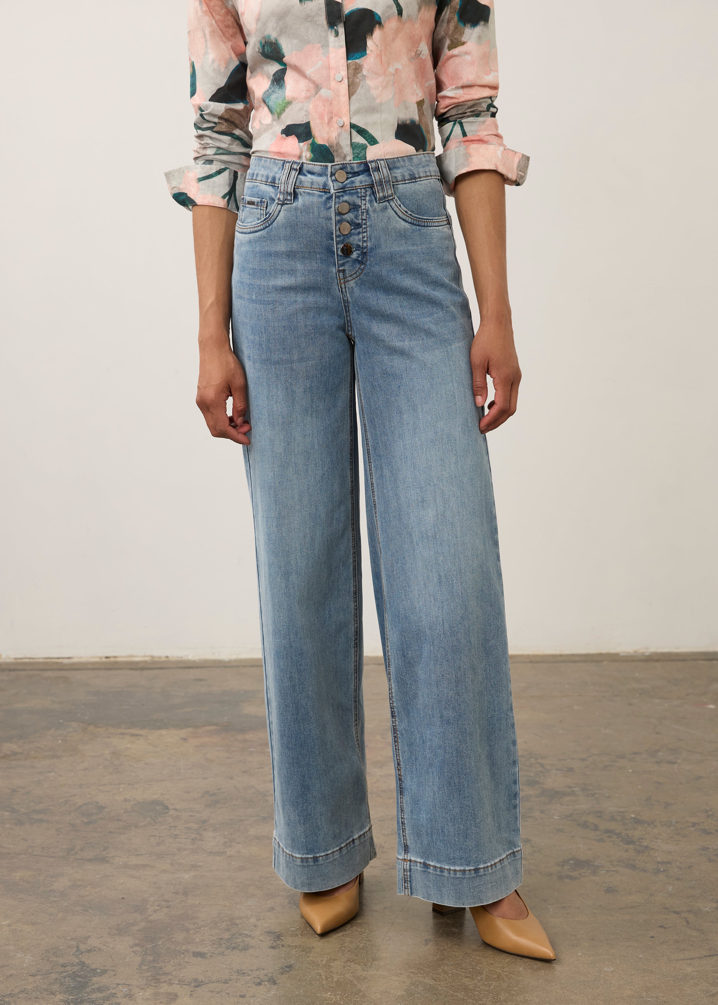 Front view of medium blue Olivia denim with mid-rise and tapered leg fit by French Dressing Jeans (FDJ)