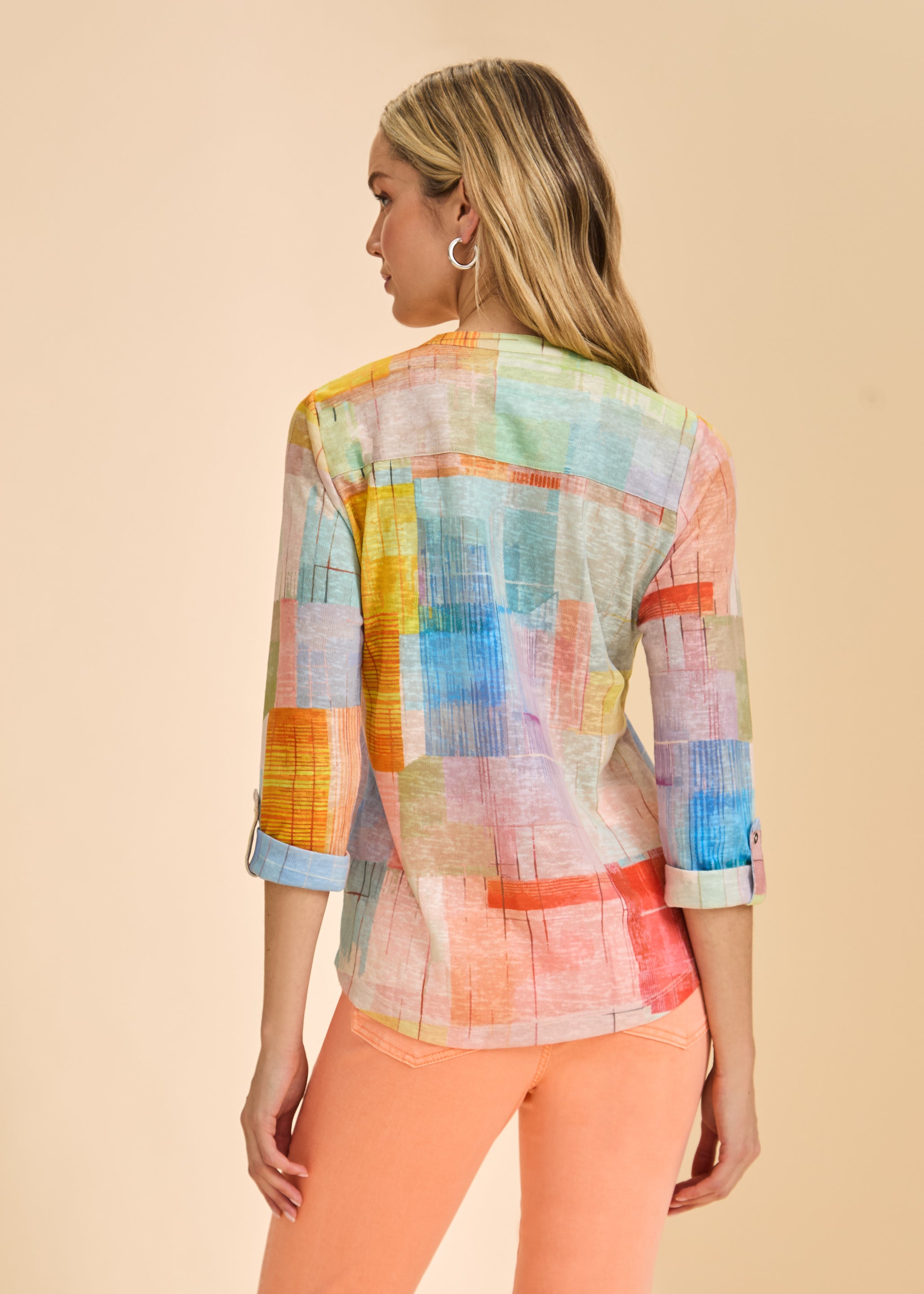 Back view highlighting pastel patchwork design on 3/4 sleeve top by French Dressing Jeans (FDJ)