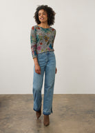 Full body view of floral top with light denim jeans, casual and colorful look by French Dressing Jeans (FDJ)