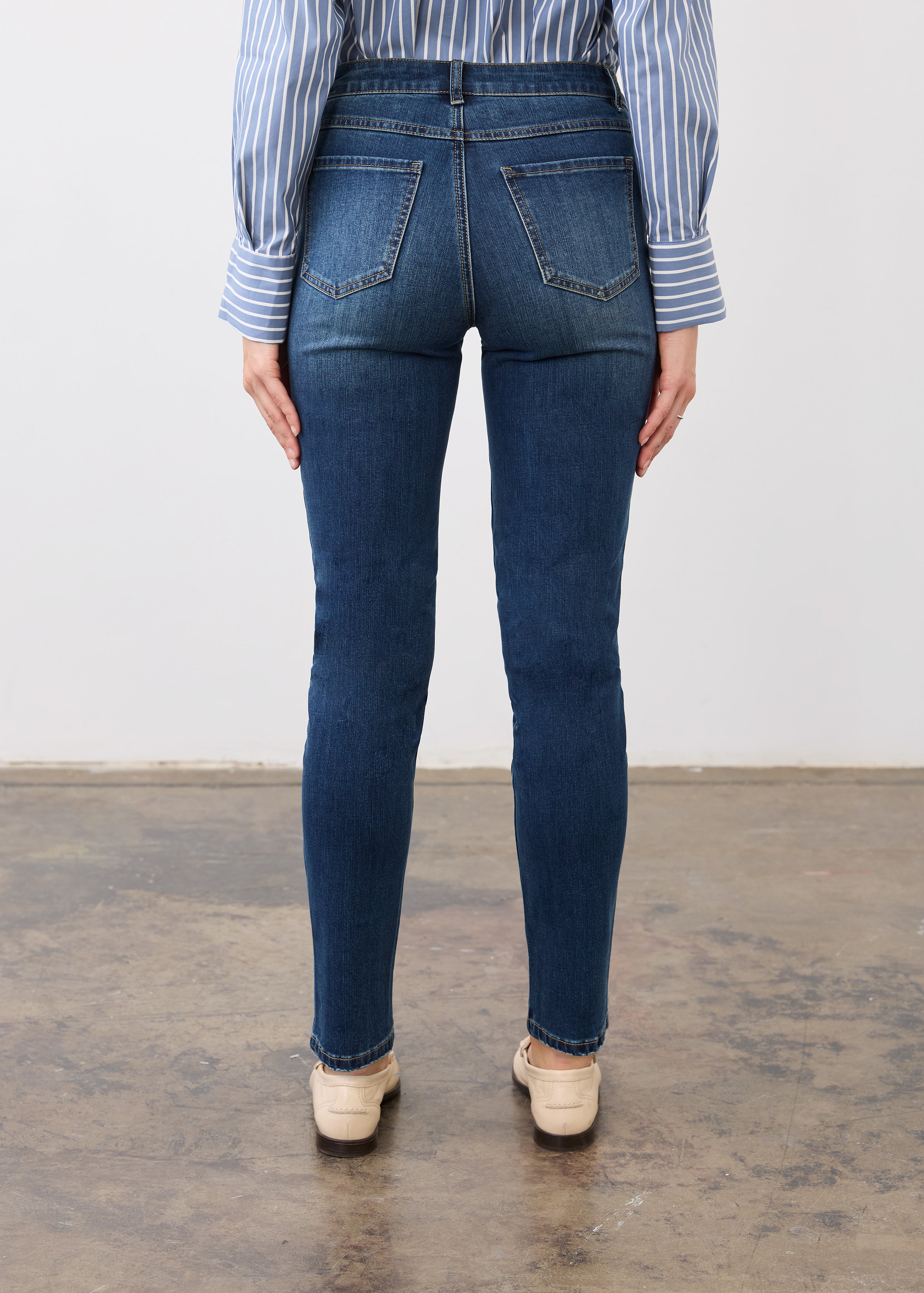 Back view of Olivia slim ankle denim in dark wash highlighting back patch pockets and slim fit by French Dressing Jeans (FDJ)