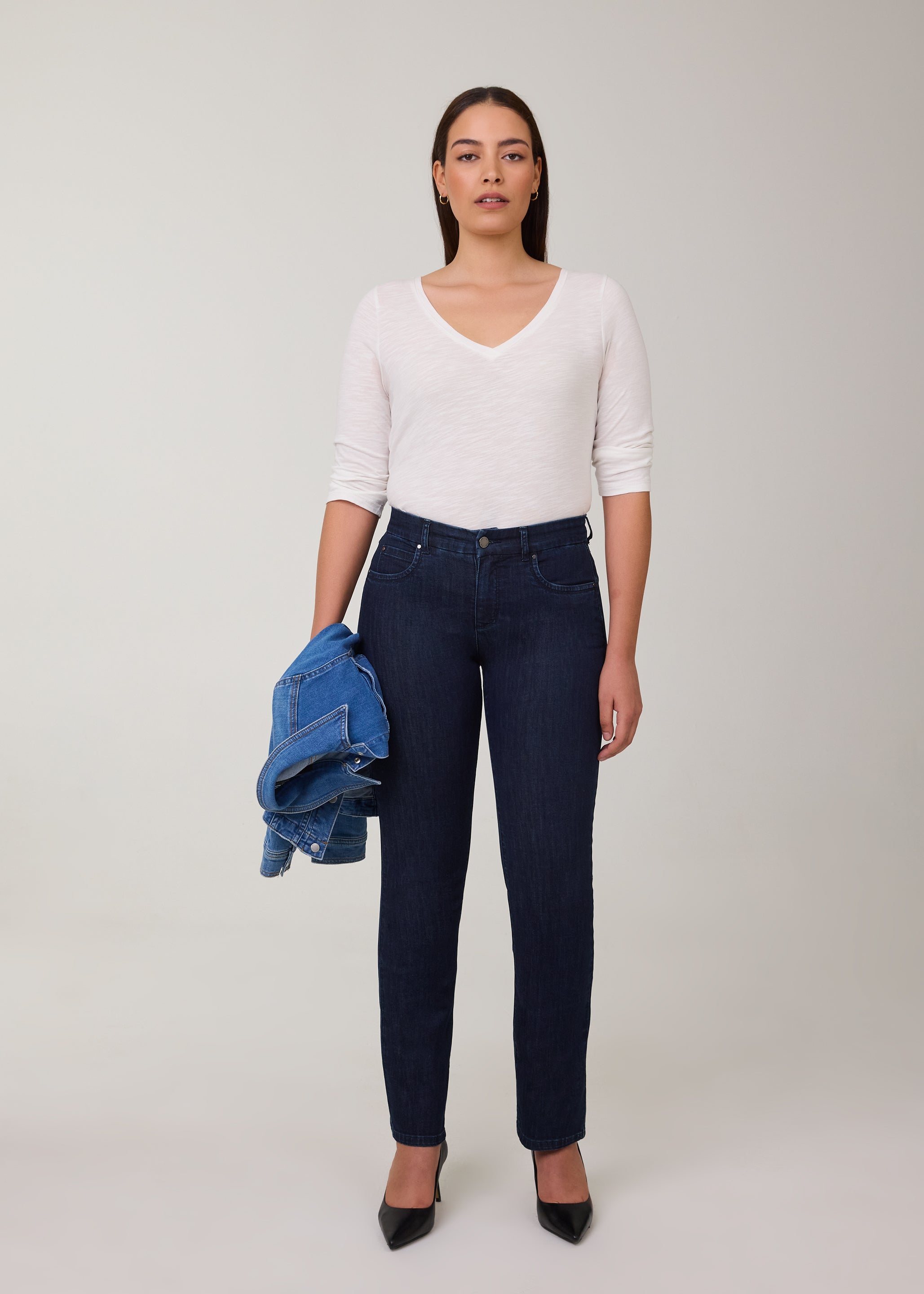 Model in slim fit straight leg jeans in Delight color by French Dressing Jeans (FDJ)