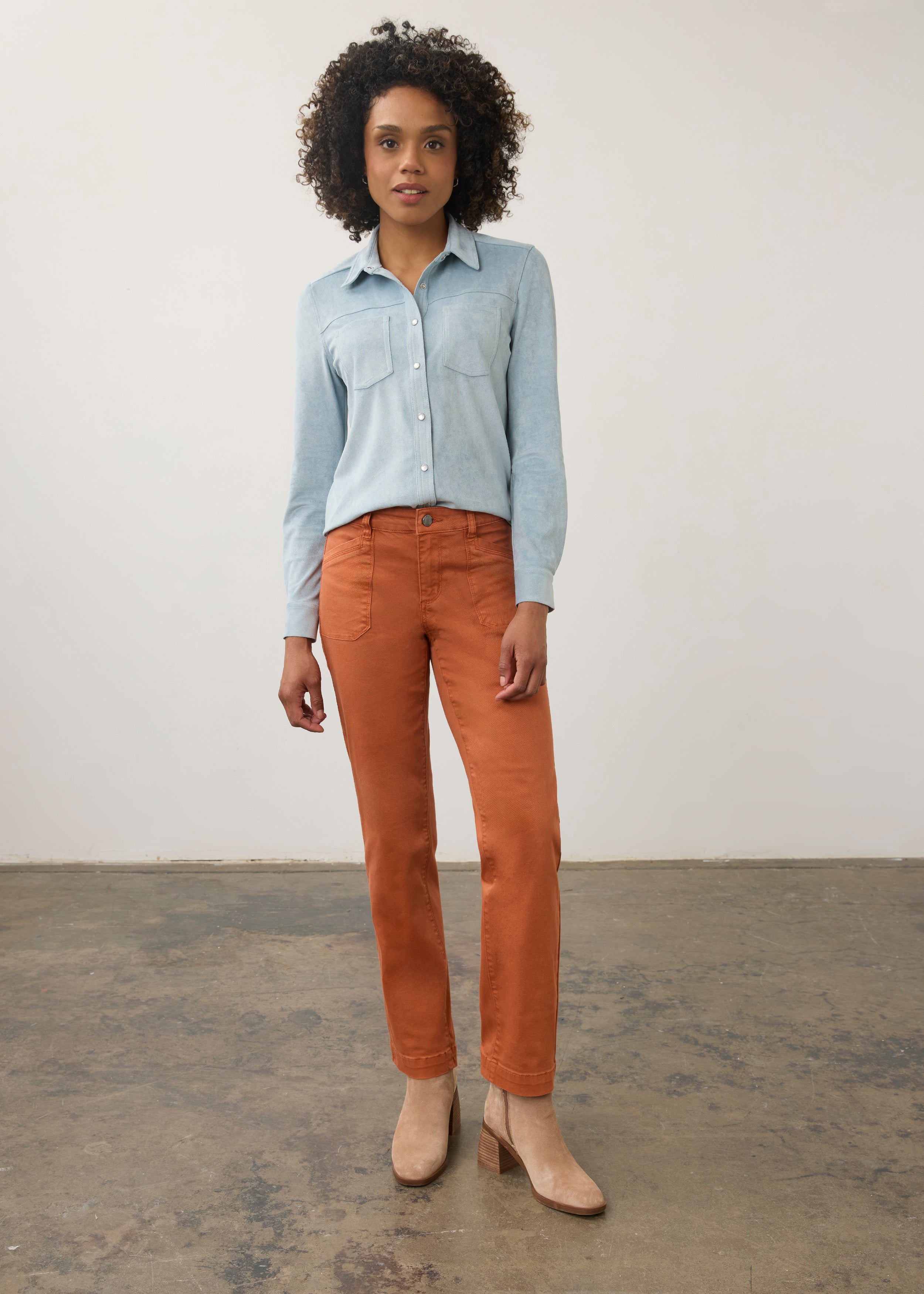 Model in light blue suede shirt and orange pants, full body view by French Dressing Jeans (FDJ)